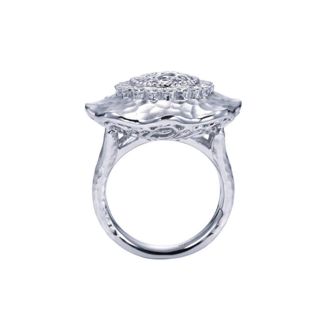 Ladies' Sterling Silver and Diamonds Fashion Ring. Stylish hammered finish is offset by feminine flower shape and milgrained filigree with embedded round diamonds. Ring contains 0.18 ctw of diamonds, H color, SI clarity.