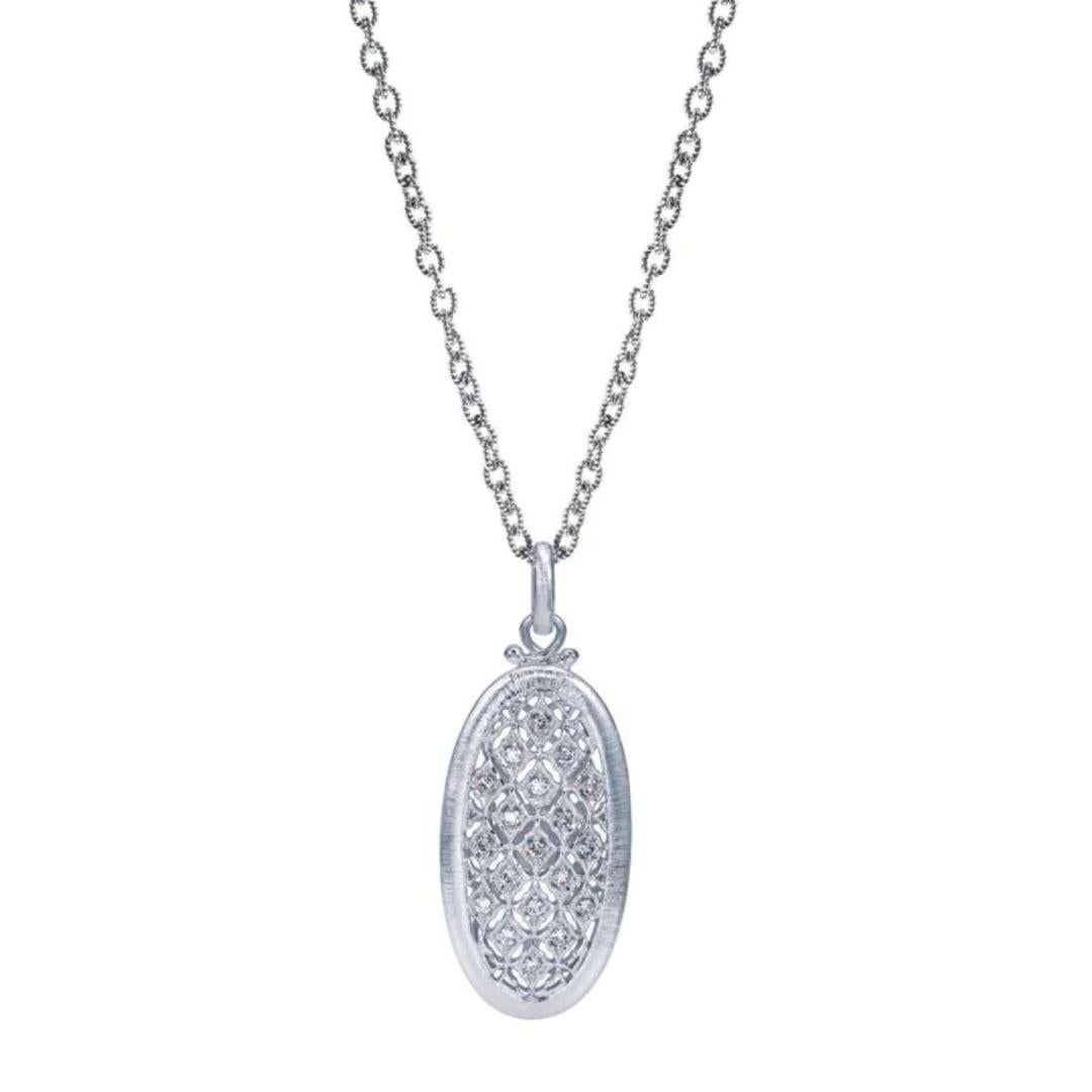 Sterling Silver and Diamonds Oval Pendant. Elaborate filigree design laces weave into a romantic and feminine scroll work, studded with premium round white diamonds. Total diamond weight is 0.36ctw, H color, SI clarity. Chain is 18