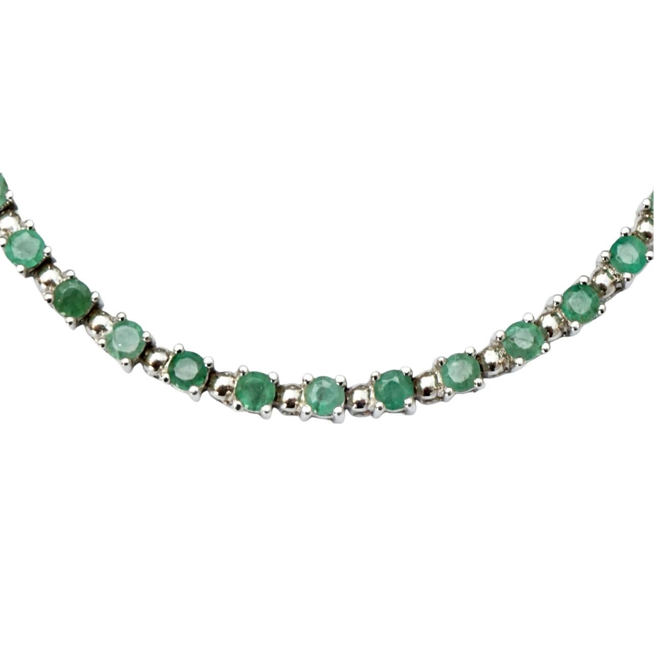 Round Cut Sterling Silver and Emerald Tennis Bracelet circa 1980s For Sale