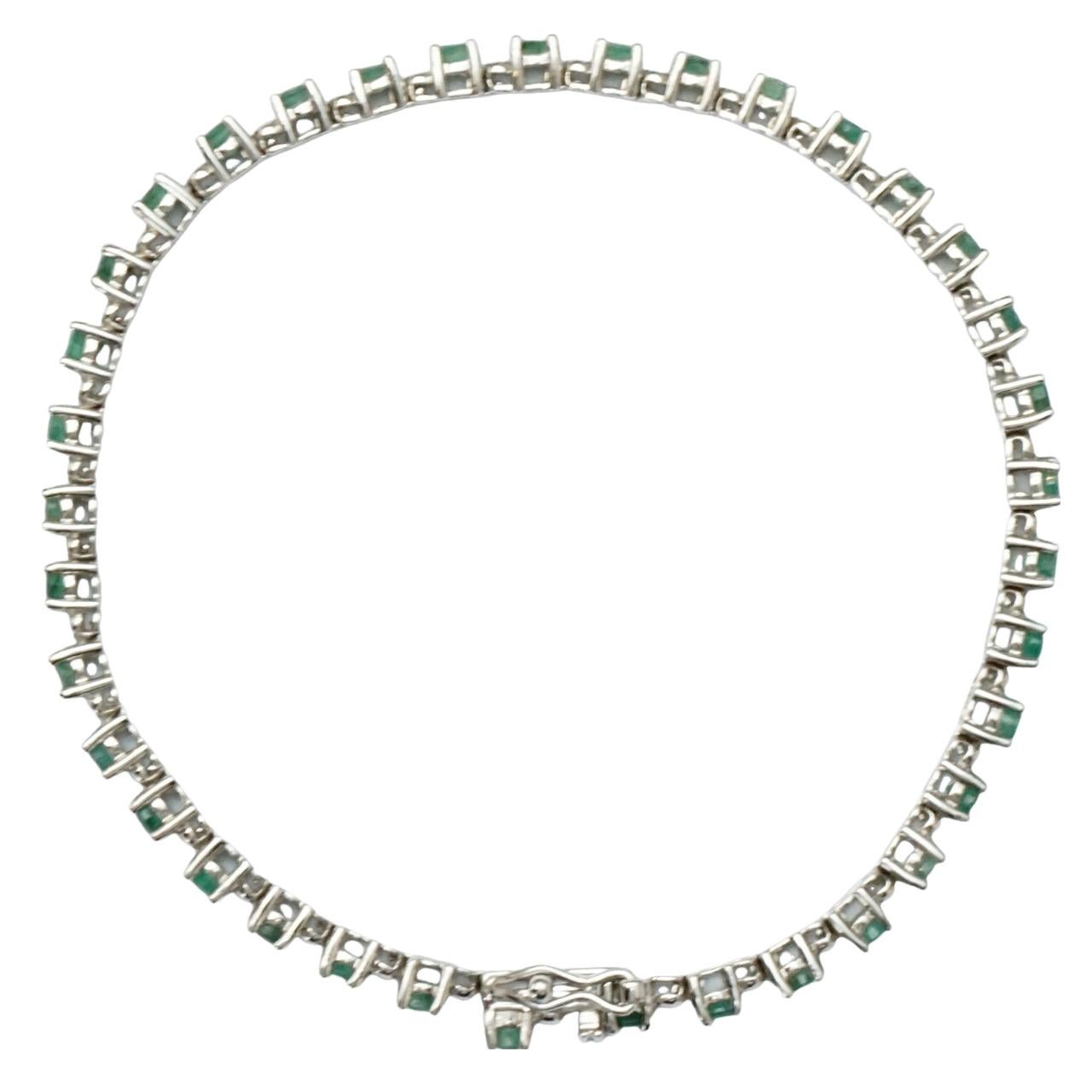 Sterling Silver and Emerald Tennis Bracelet circa 1980s For Sale 2
