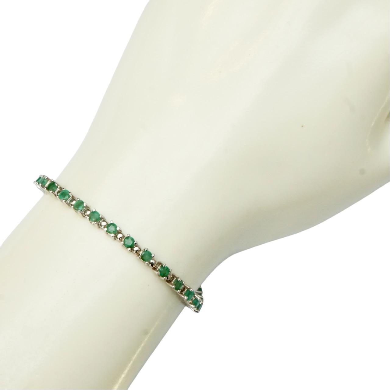 Sterling Silver and Emerald Tennis Bracelet circa 1980s For Sale 3