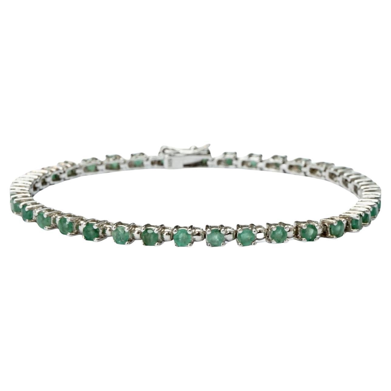 Sterling Silver and Emerald Tennis Bracelet circa 1980s