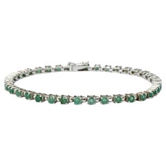Sterling Silver and Emerald Tennis Bracelet circa 1980s
