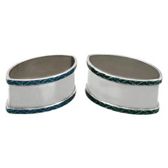 Servilleteros de plata de ley y esmalte de Liberty & Co Ltd.