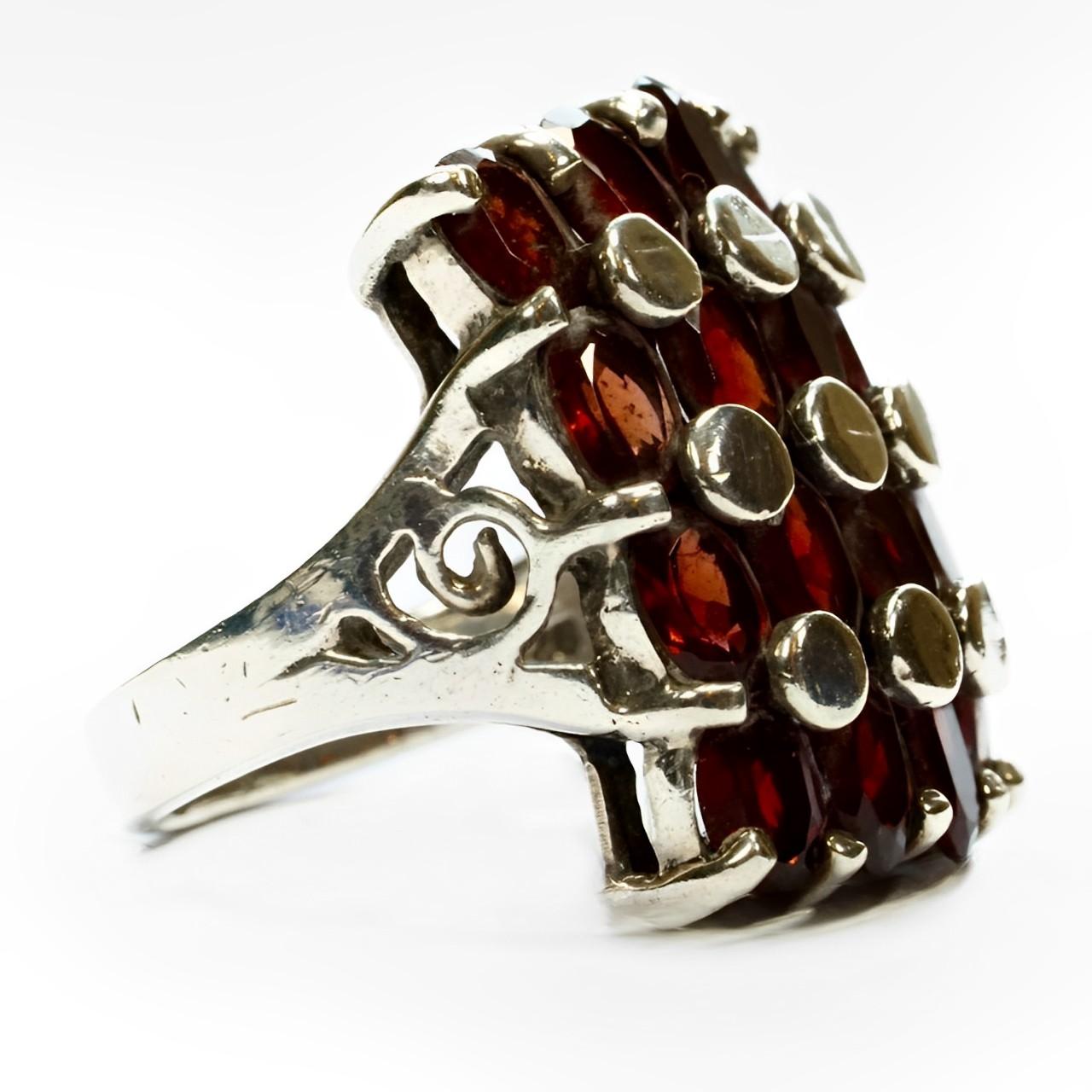 Artisan Sterling Silver and Garnet Statement Ring with Silver Circle Detail For Sale
