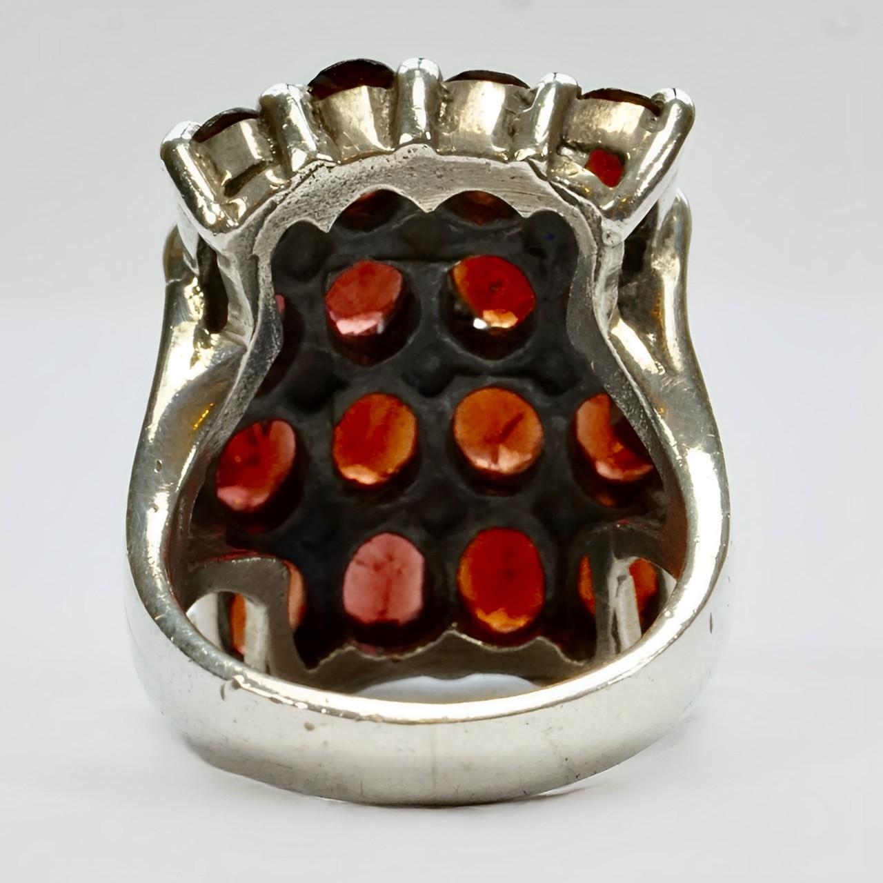 Marquise Cut Sterling Silver and Garnet Statement Ring with Silver Circle Detail For Sale