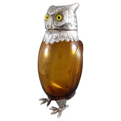 Jarra de clarete de plata de ley y búho de cristal