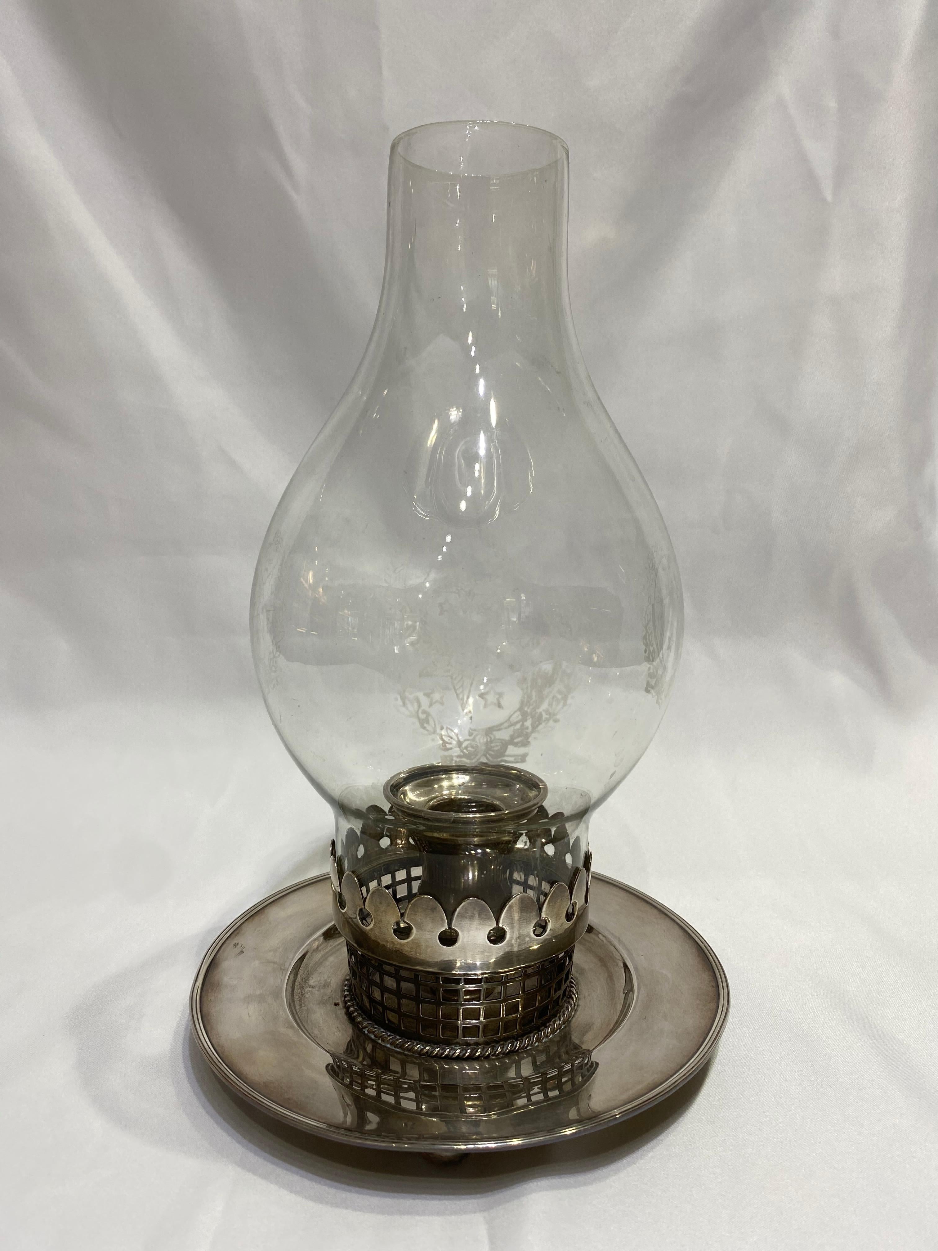 Product details:

Circa 1900.
Featuring sterling silver and hand blown etched glass with star motif. 
Stamped Sterling on the bottom.
The weight is 478.8 g. and 399.0 g. 