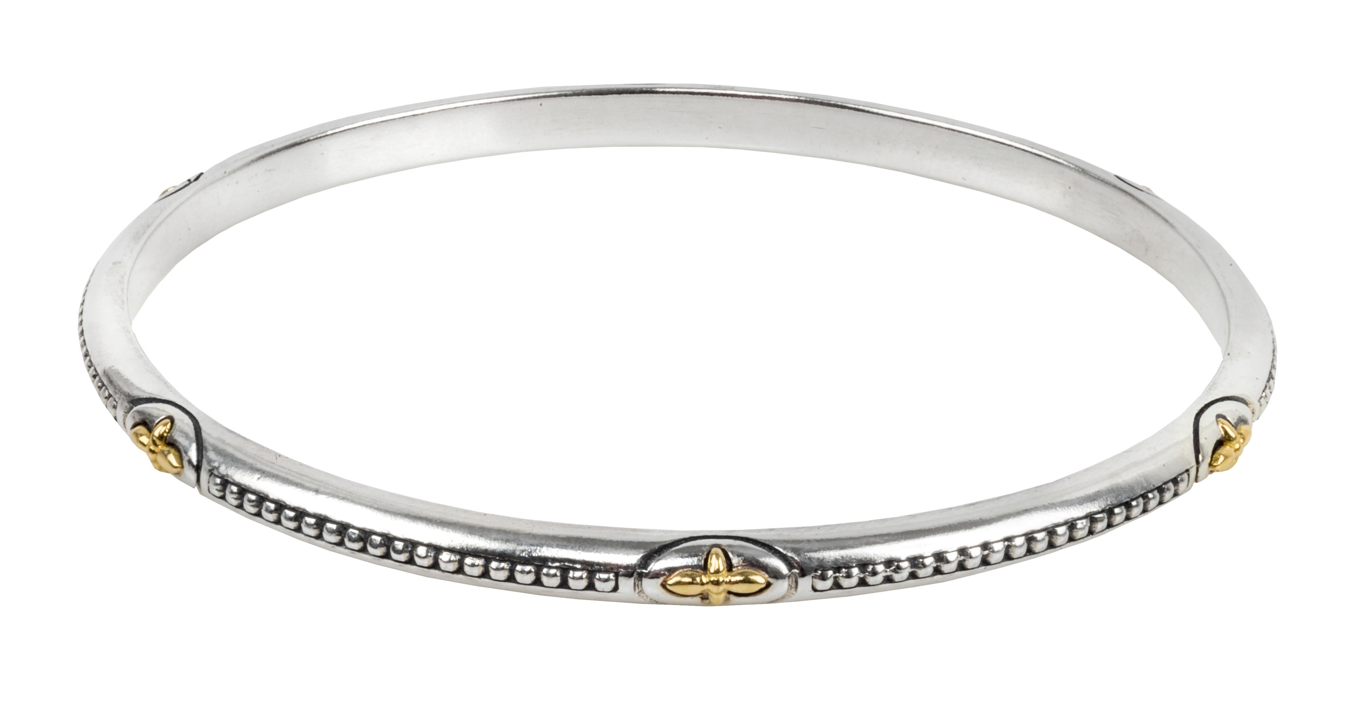 Bangle Bracelet made of 18K yellow gold and Sterling Silver in the Konstantino Astria Collection. Stamped Konstantino. 925 and 750.  