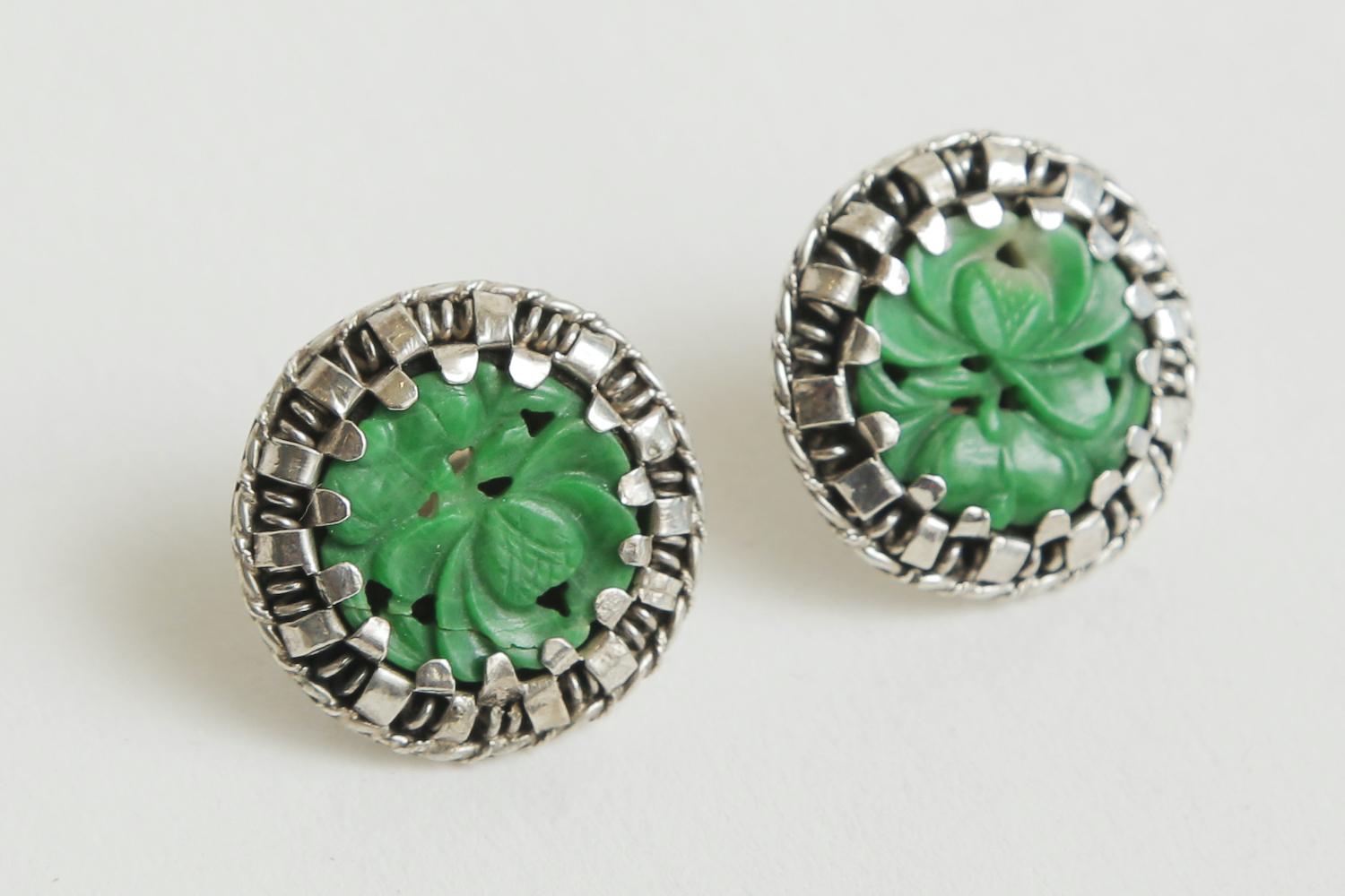 These lovely pierced vintage sterling silver and carved jade earrings are vintage from the 70's.  They have many hallmarks on them. They are from China.
