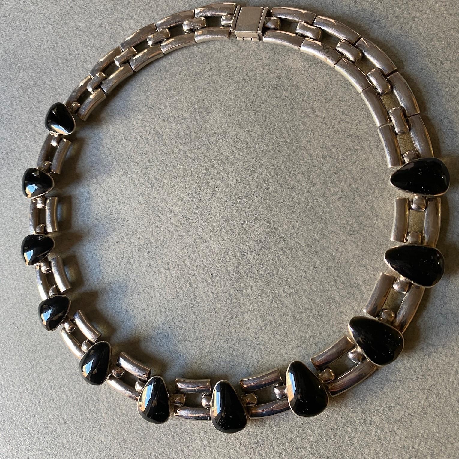  Sterling Silver and Onyx Collar Necklace by Antonio Pineda



Designer: Antonio Pineda
Maker: Antonio Pineda
Circa: 1953-1979
Dimensions:
Country of Origin: Taxco, Mexico

INV NO: NEC-03


**Antonio Pineda was an internationally renowned Mexican