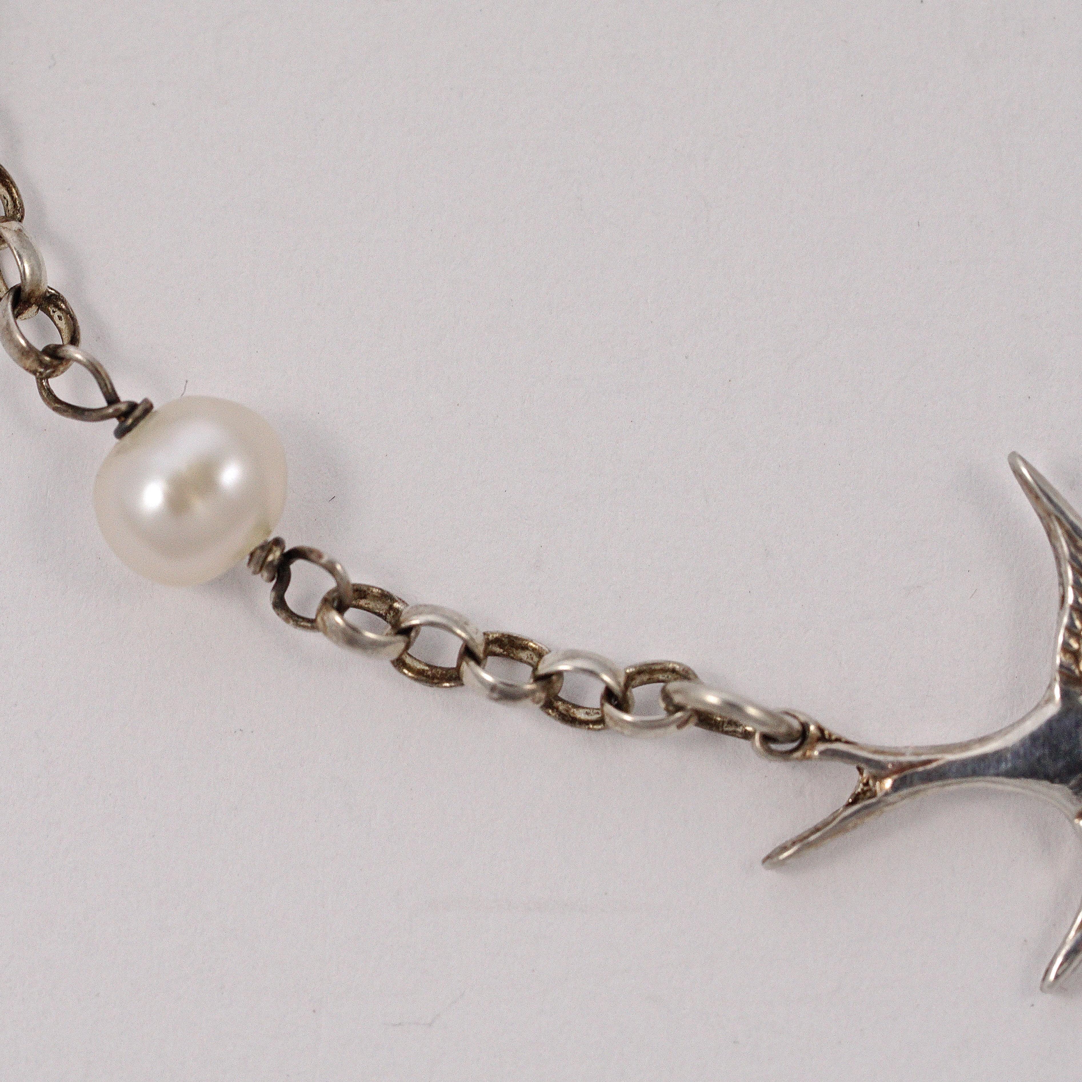 Uncut Sterling Silver and Oval Freshwater Pearl Swallow Bracelet 
