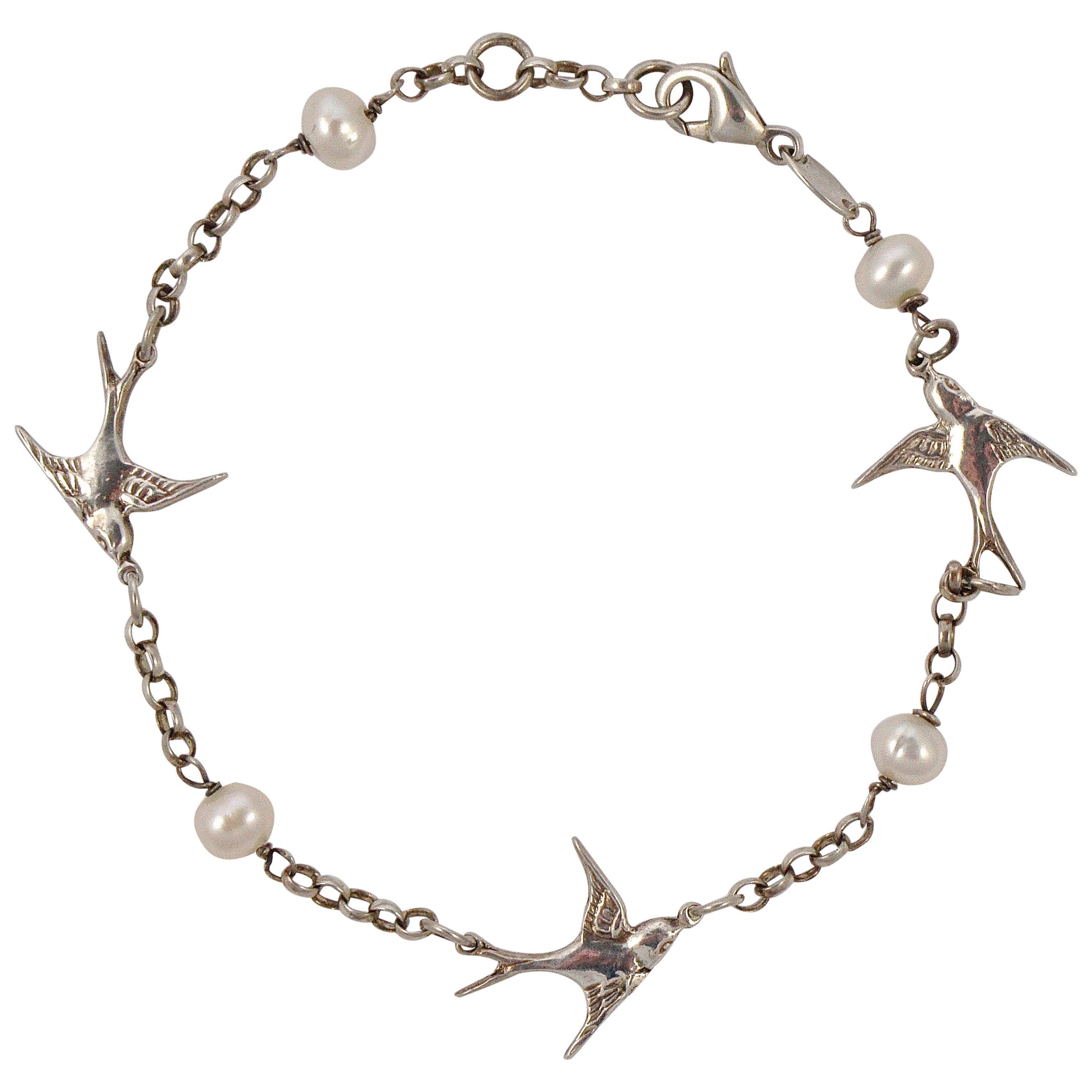 Sterling Silver and Oval Freshwater Pearl Swallow Bracelet 