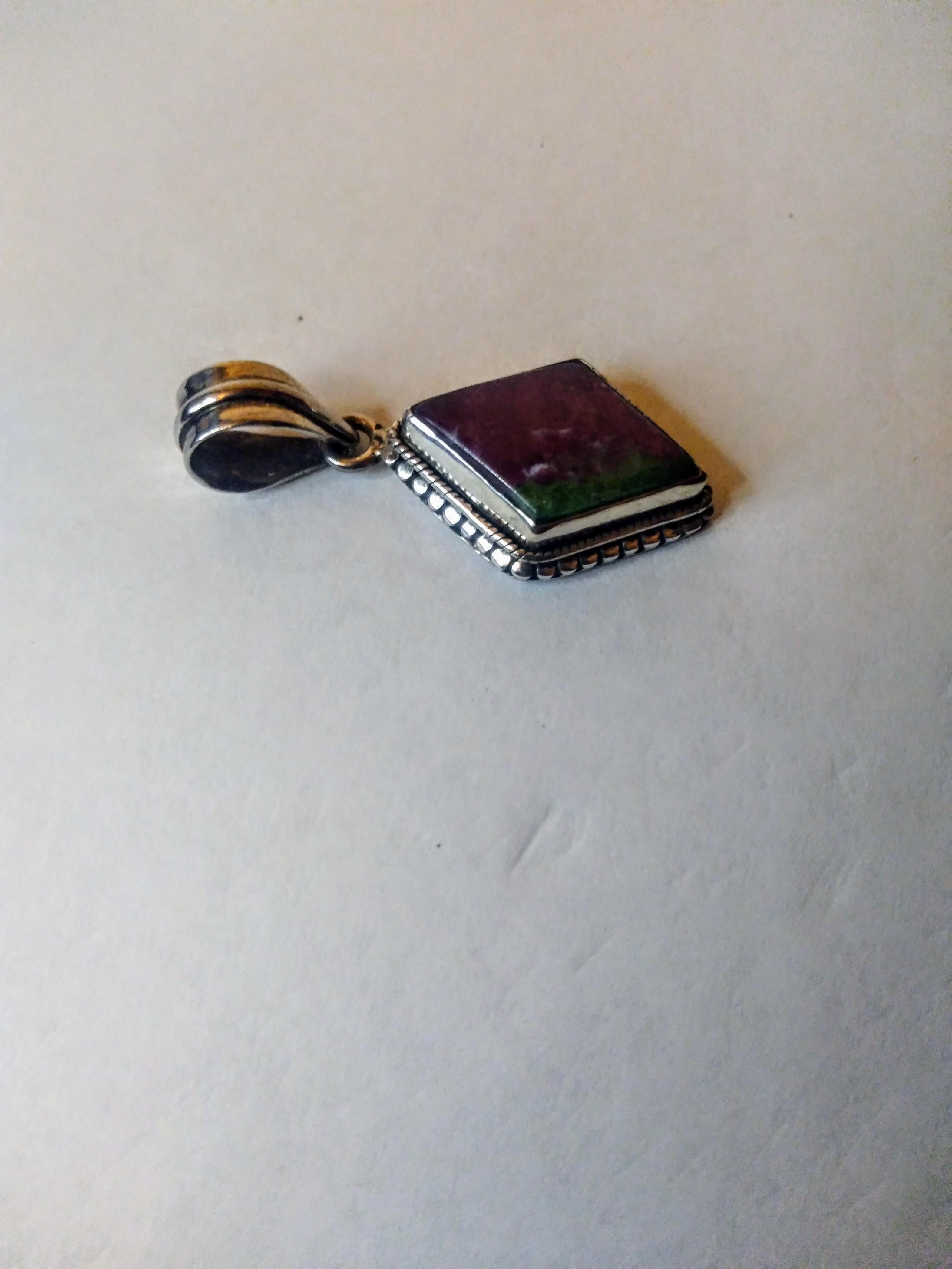 Hand-Crafted Sterling Silver and Purple with Green Inclusion Zoisite Pendant For Sale