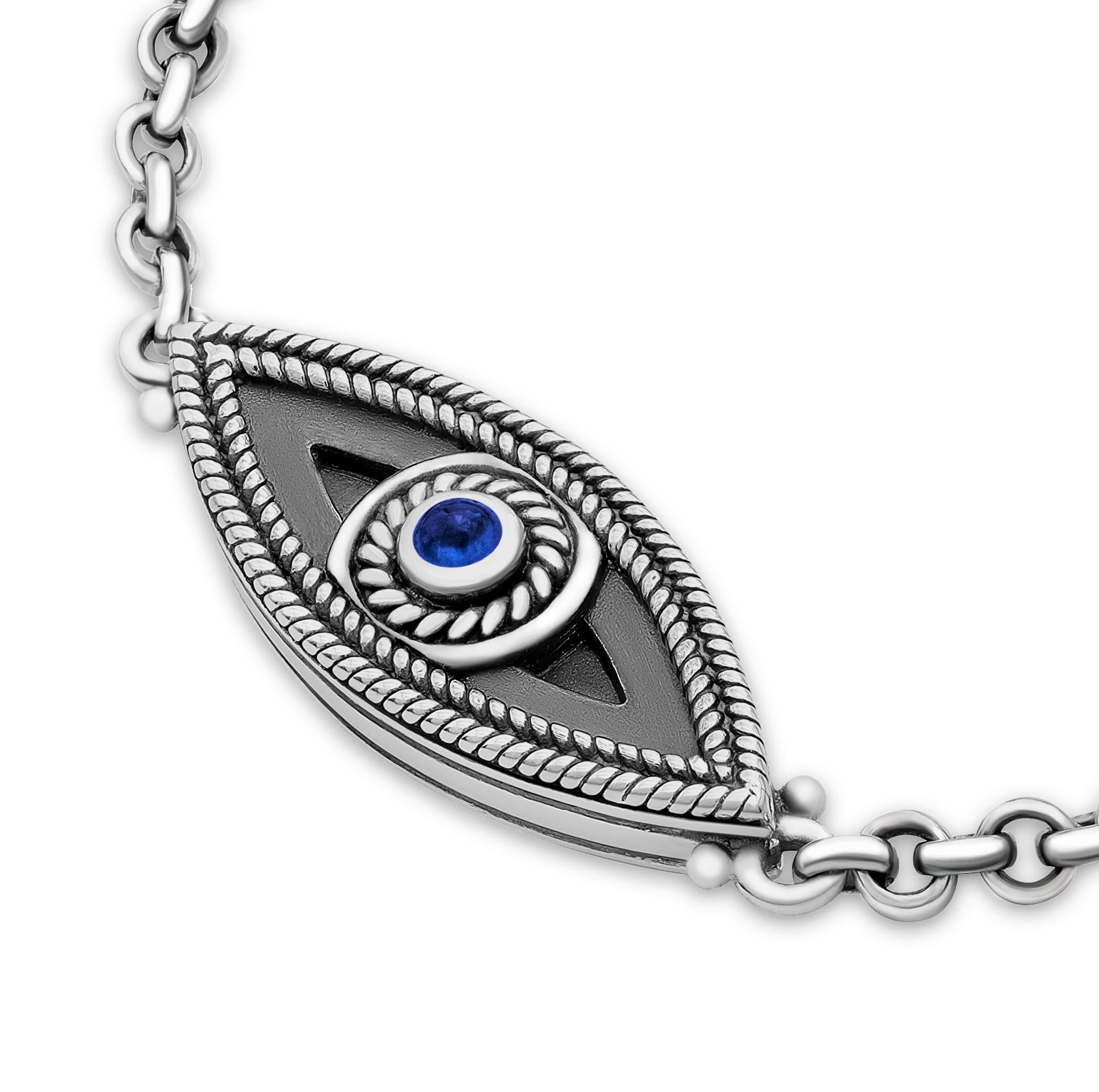 Sterling Silver Keychain to protect the wearer from the evil eye.

Featuring the eye, a symbol known throughout the Middle East for warding off envy, the Sterling Silver easy-closure Protection Key Chain is adorned with Sapphires.

Full Keychain