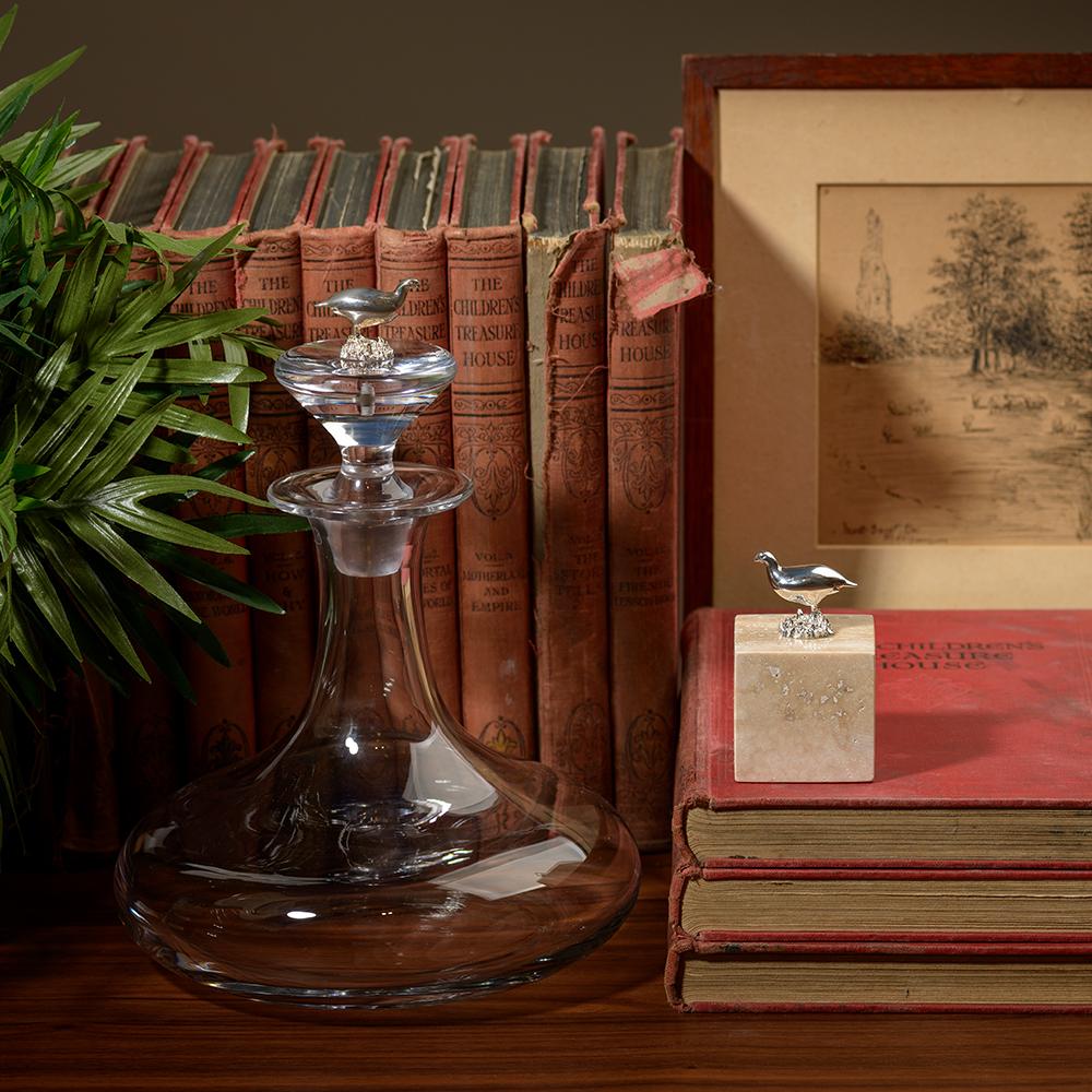 Sterling silver and travertine grouse cube

The Grouse Cube is the perfect modern desk accessory. Juxtaposing silver and polished travertine, this objet d'art is both a paperweight and a piece of modern sculpture. Made to Order in 4 weeks. Also