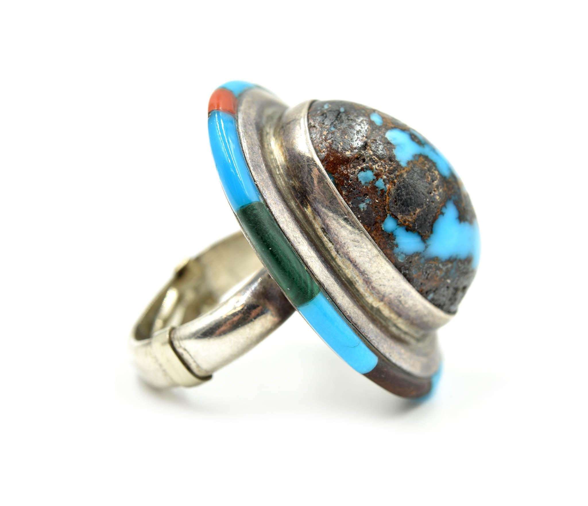 Designer: Sanchez
Material: sterling silver
Gemstones: turquoise, lapis, coral and malachite
Ring Size: 6 
Weight: 27.35 grams


