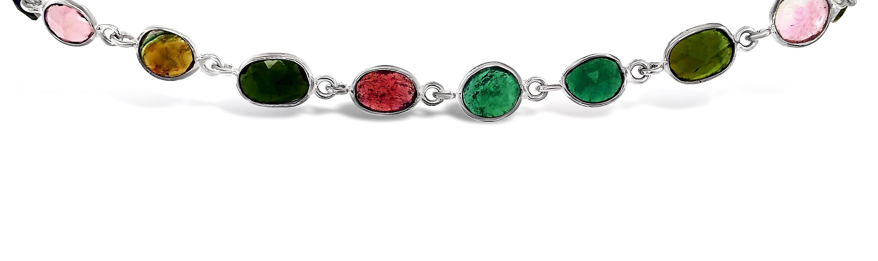 Tourmaline is the most prized of the semiprecious stones and this watermelon tourmaline is shown in stones from rose to raspberry, from moss to fern. The rose cut reflects on natural light with brilliance and strong settings maintain its quality and