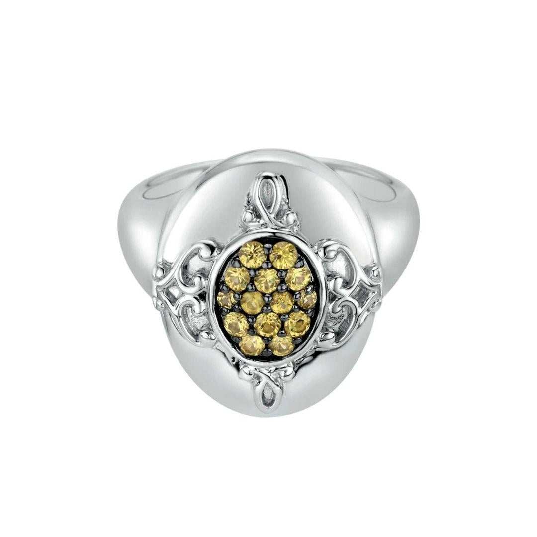Ladies' Sterling Silver and Yellow Sapphire Fashion Ring. Royal oval design with filigree design and pave set yellow sapphires in black rhodium backdrop. Total gemstone weight is 0.34 ctw.