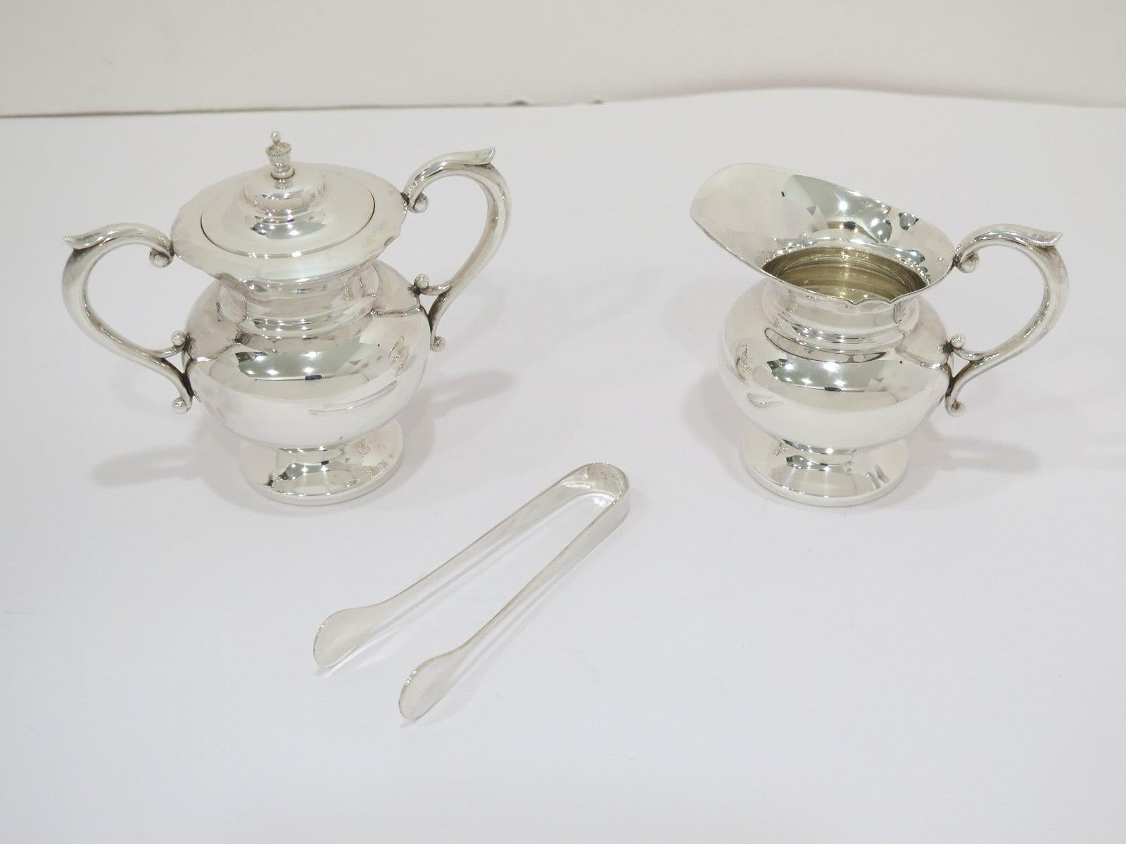 Sugar Bowl (H x L x D): 4 x 4.75 x 2 5/8 in

Creamer (H x L x D): 3 1/8 x 4 x 2.5 in

Sugar Tongs: 4 in

Weight: 6.2 toz.