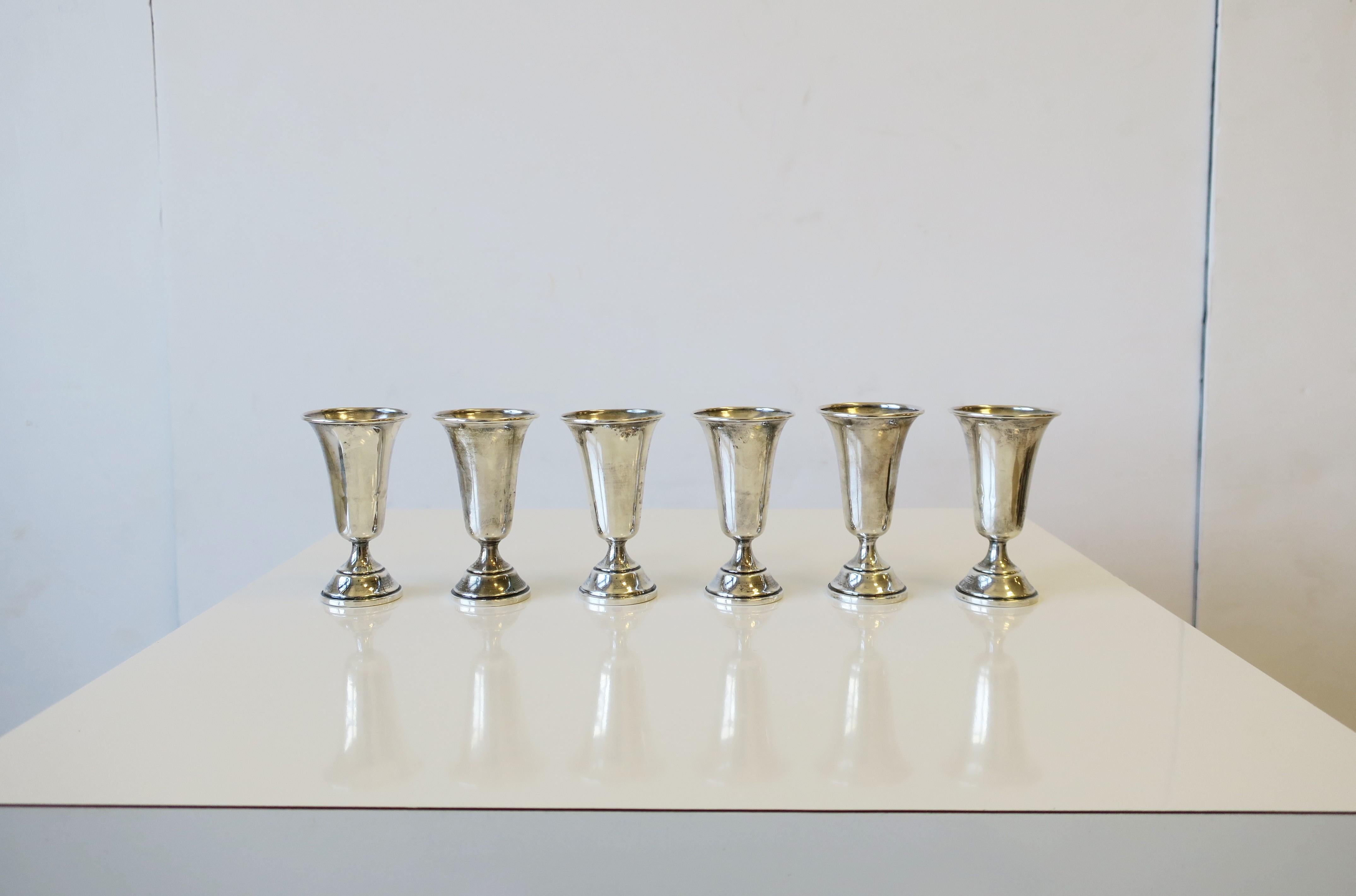 An antique set of six (6) sterling silver aperitif cordial liquor/spirit cups or vodka shot glasses, circa early-20th century. Sterling silver chills very well so great for vodka shots or other liquor. Set with original fitted box. Marked 