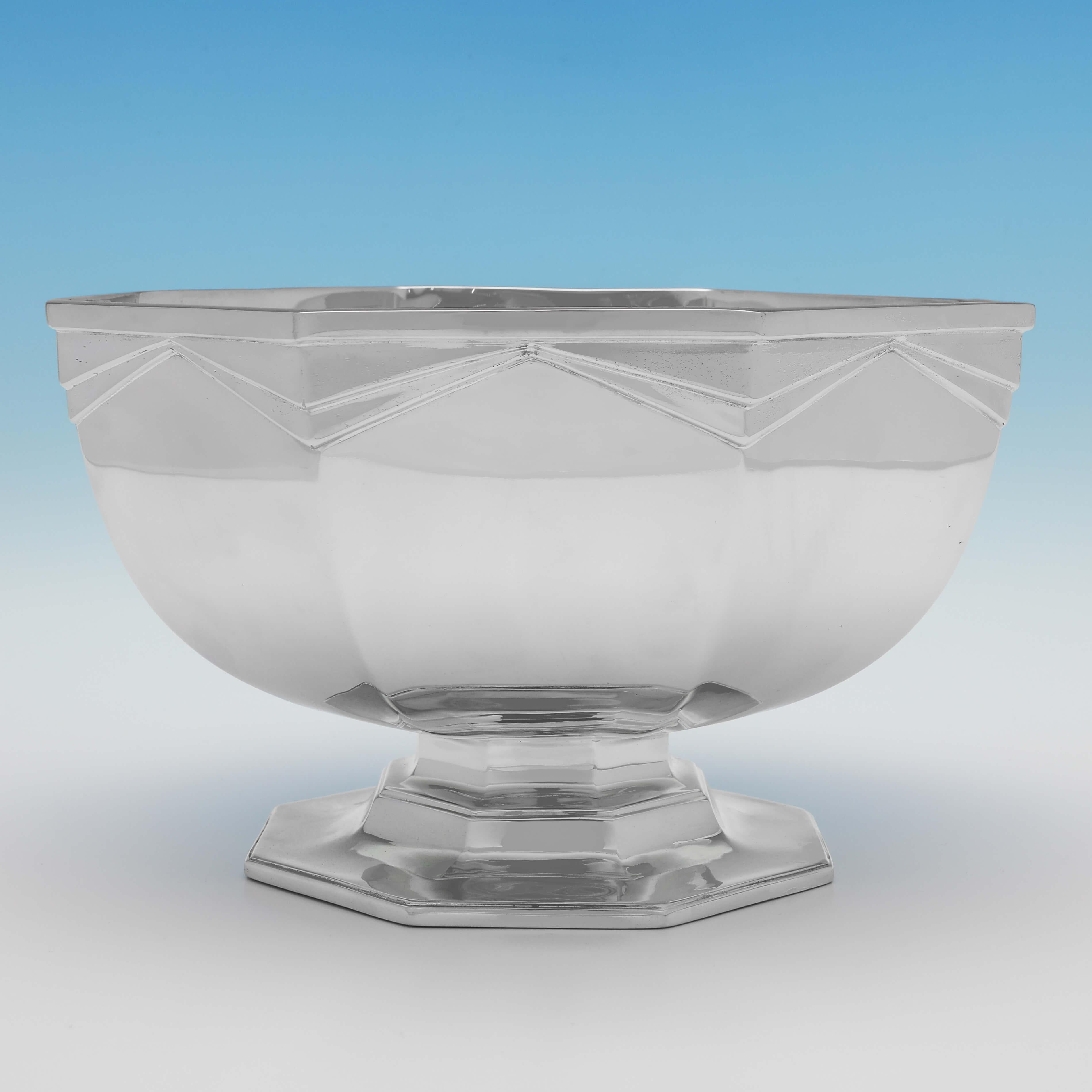 Hallmarked in London in 1932 by Goldsmiths & Silversmiths Co., this very handsome, sterling silver bowl, is octagonal in shape, and has Art Deco influenced decoration to the sides. The bowl measures 5