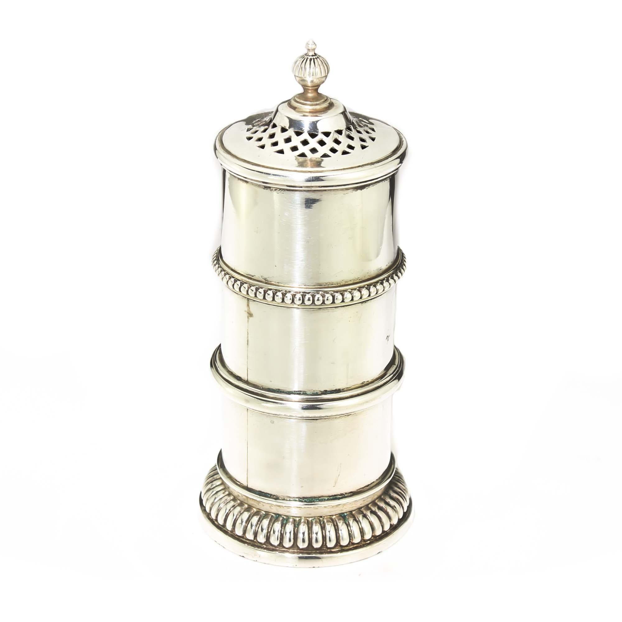 Sterling silver Art Deco sugar caster
Maker: James Dixon & Sons 
Made in England, Sheffield, 1926
Fully hallmarked.

Dimensions - 
Diameter x height: 6.8 x 15.5 cm 
Weight : 266 grams total

Condition: Minor wear from general usage, minor