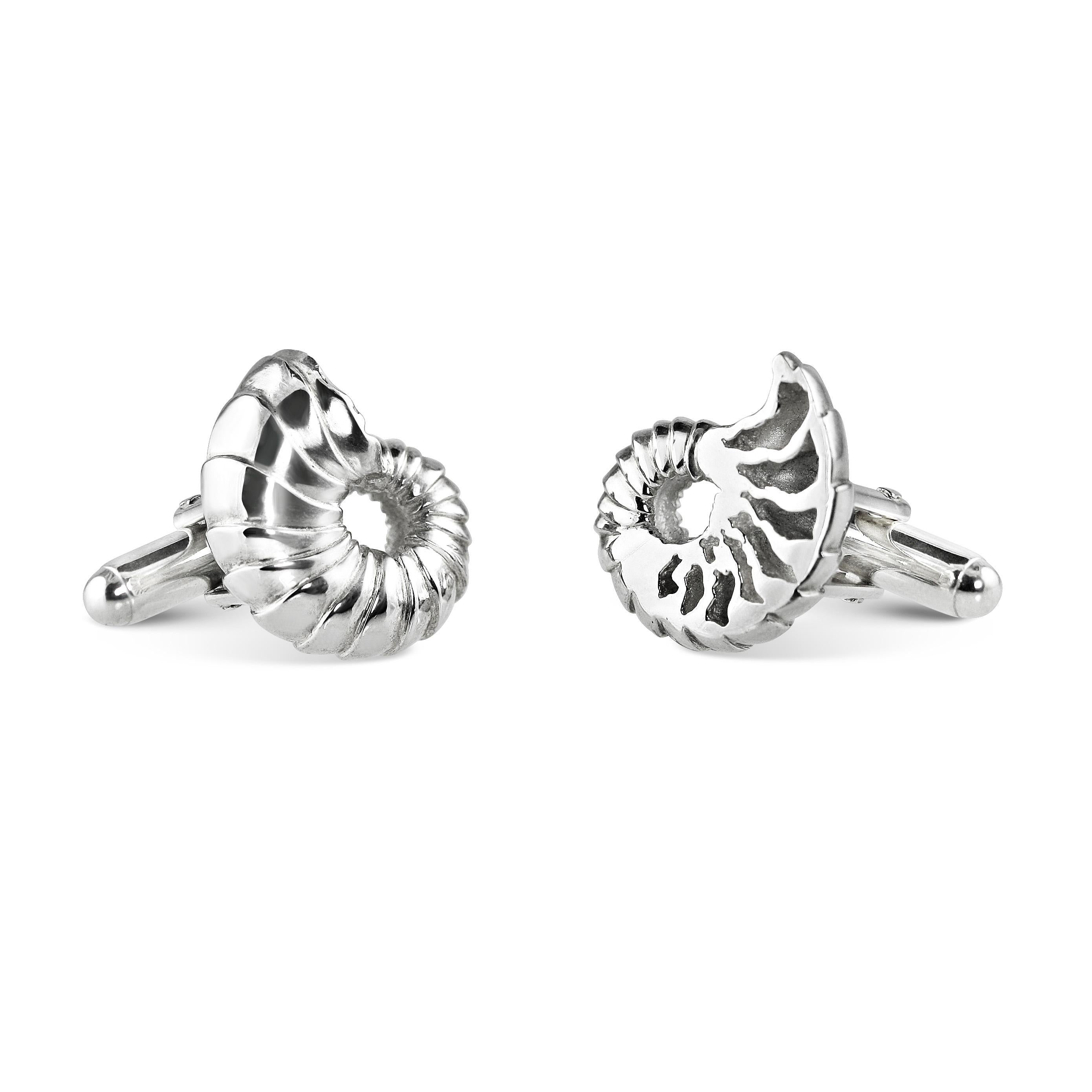 Asymmetrical ammonite shell cufflinks. These cufflinks exude natural elegance & intrigue.

The Ammonite Cufflinks are moulded directly from a real fossilised Ammonite shell. This gives the cufflinks real depth and detail. 

These cufflinks are made