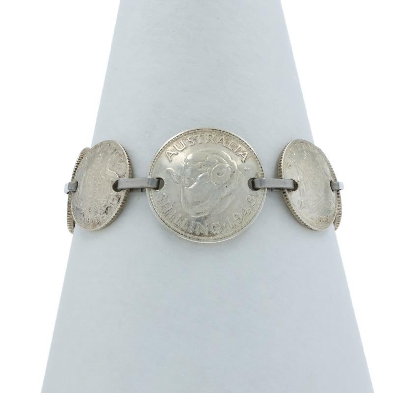 Design:  Australian vintage coin bracelet

Metal Content: Sterling Silver

Bracelet Style: Link
Fastening Type: Hook Clasp
Theme: Currency

Measurements

Chain Width: 3/32