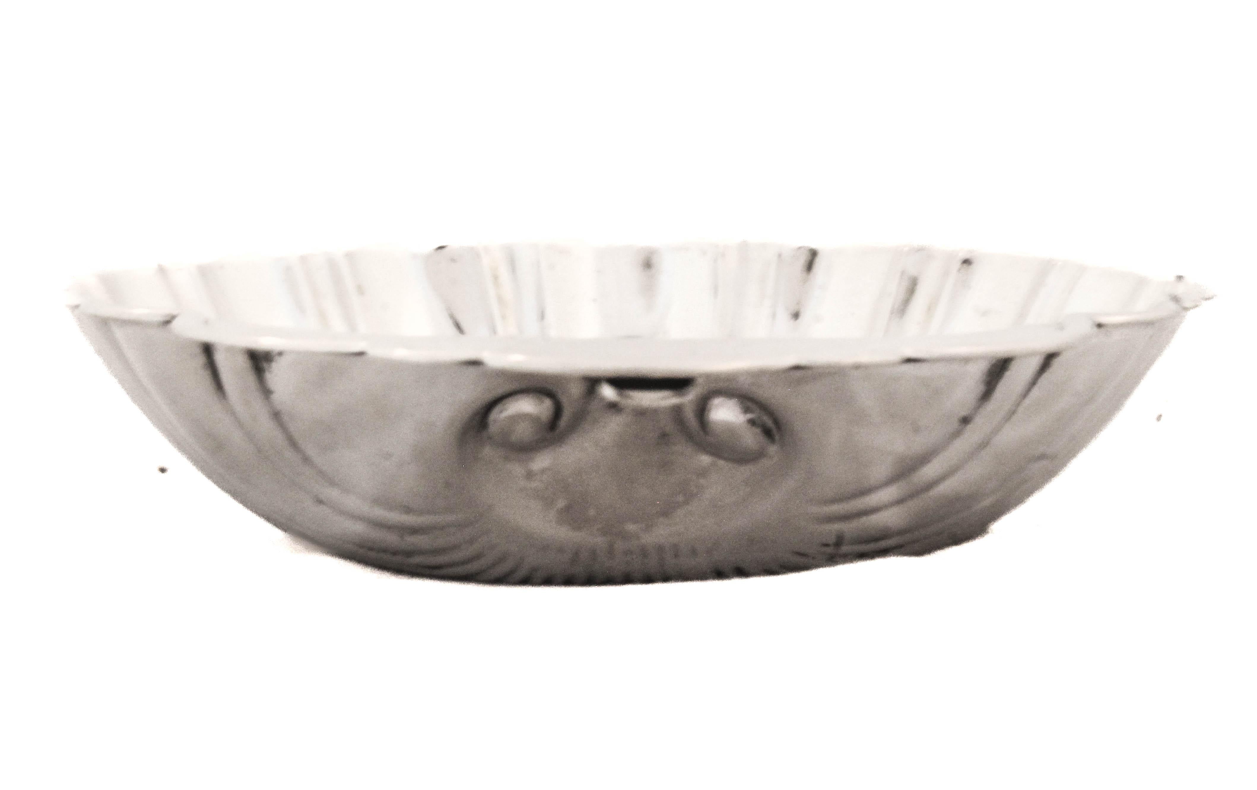 Looking for a gift for a newborn baby?  Search no more; we have the perfect gift!  A sterling silver shell-dish to use at a baptism ceremony.  This is the right size and shape to scoop out water from the baptismal fountain and sprinkle on the