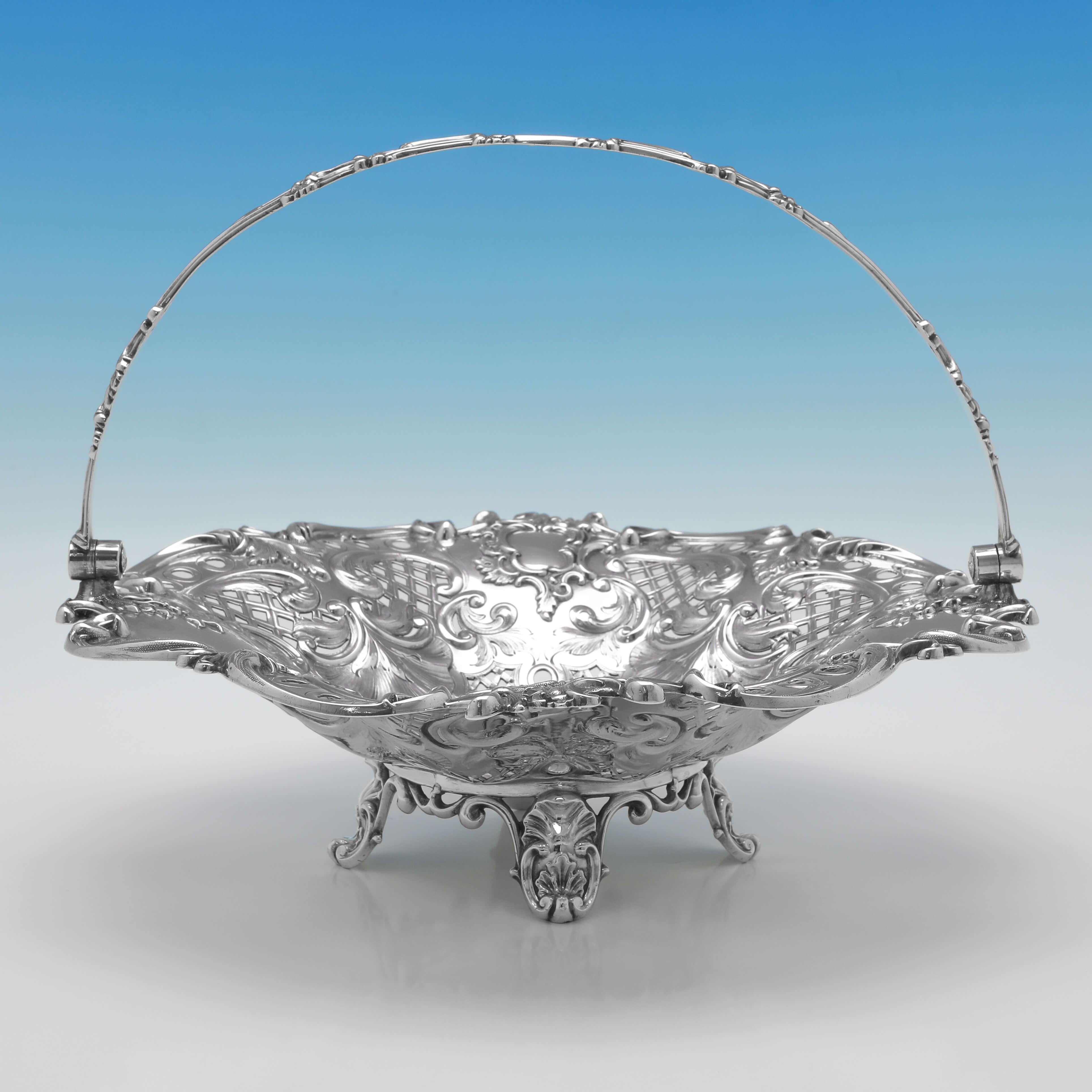 Hallmarked in Sheffield in 1845 by Hawksworth Eyres & Co., this attractive, Antique Sterling Silver Basket, is ornate in design, standing on cast shell feet, and featuring pierced and repoussé decoration to the body. The basket measures 8.75