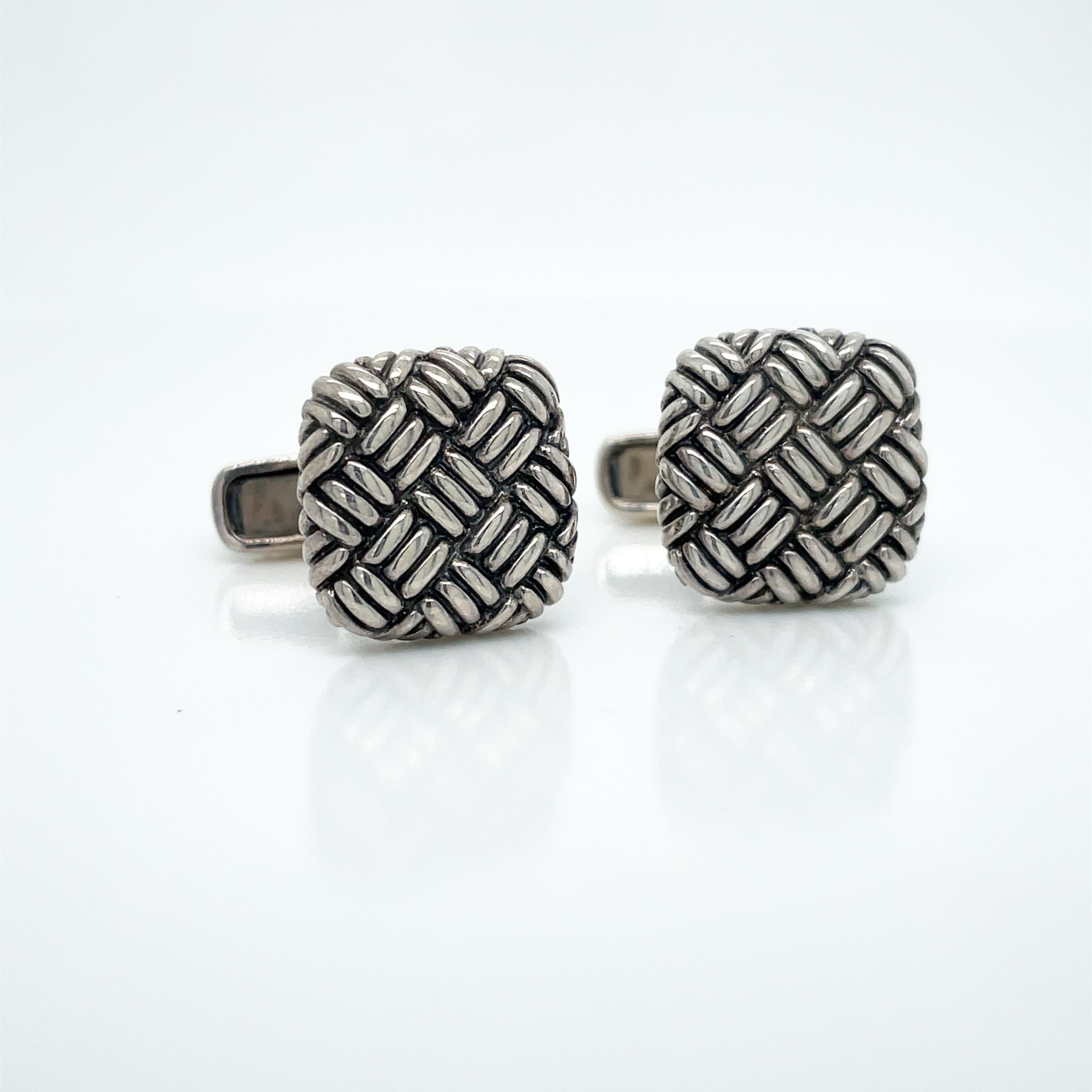 This is a classic pair of sterling silver cufflinks that feature a lovely basket weave design. This set of cufflinks would look excellent with any shirt for any occasion. These cufflinks are new and have never been worn. 

— — —

We offer a