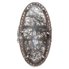 Anillo Bavna de plata de ley con labradorita y diamantes talla US 7