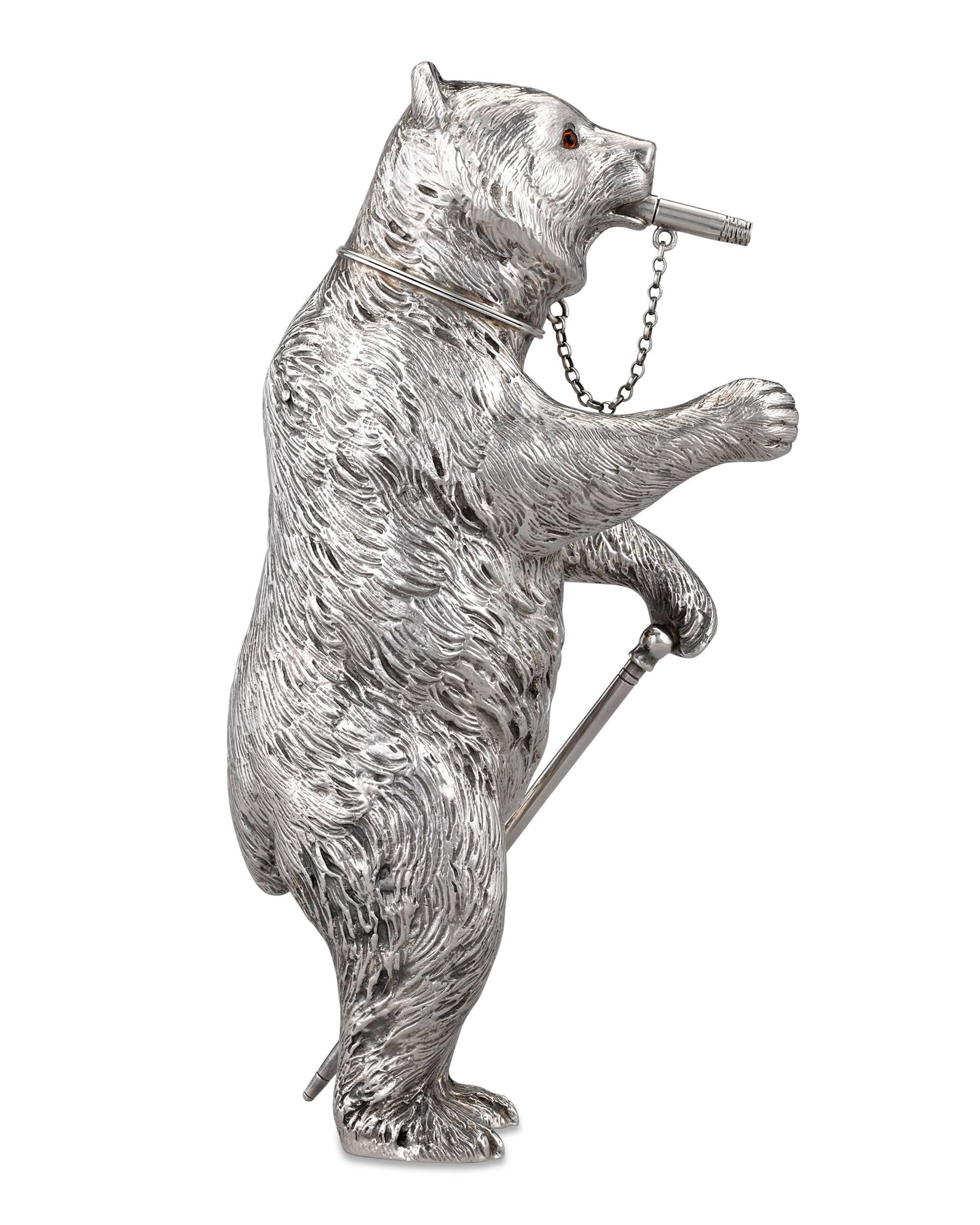 This highly imaginative sterling silver cocktail shaker takes the shape of a humorous and realistically modeled bear. Donning a walking stick and smoking a cigar, the ursine shaker embodies the joie de vivre of the era. The design is equally