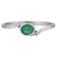 Sterling Silver Bezel Set Oval Emerald & Diamond Bypass Ring by Silvorra
