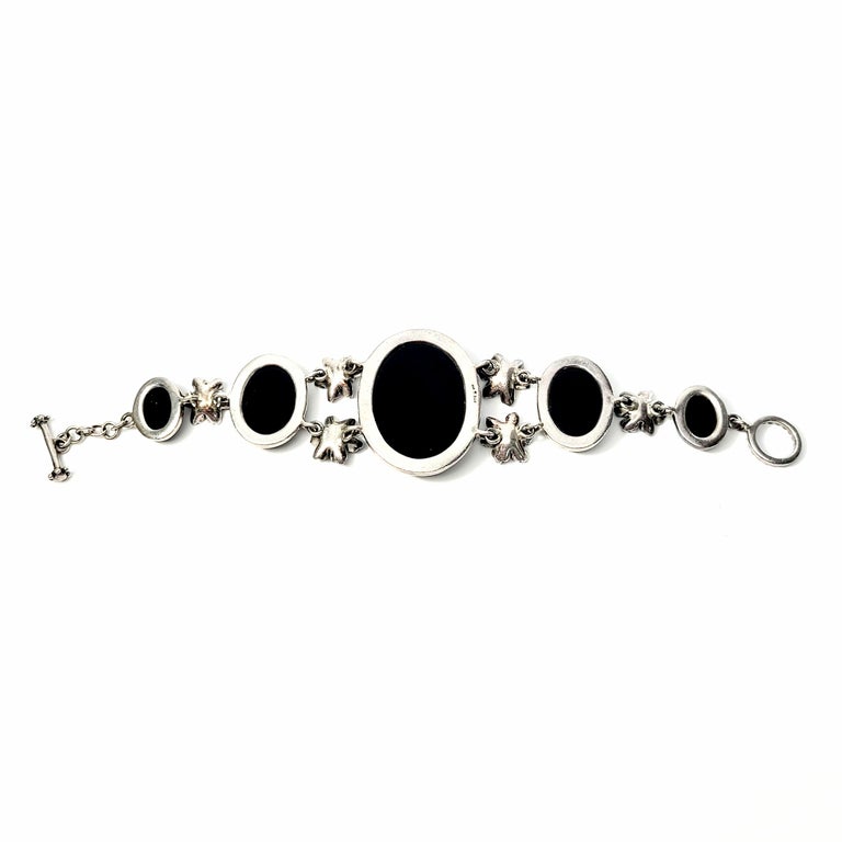 Cabochon Sterling Silver Black and Onyx Flower Link Toggle Bracelet For Sale