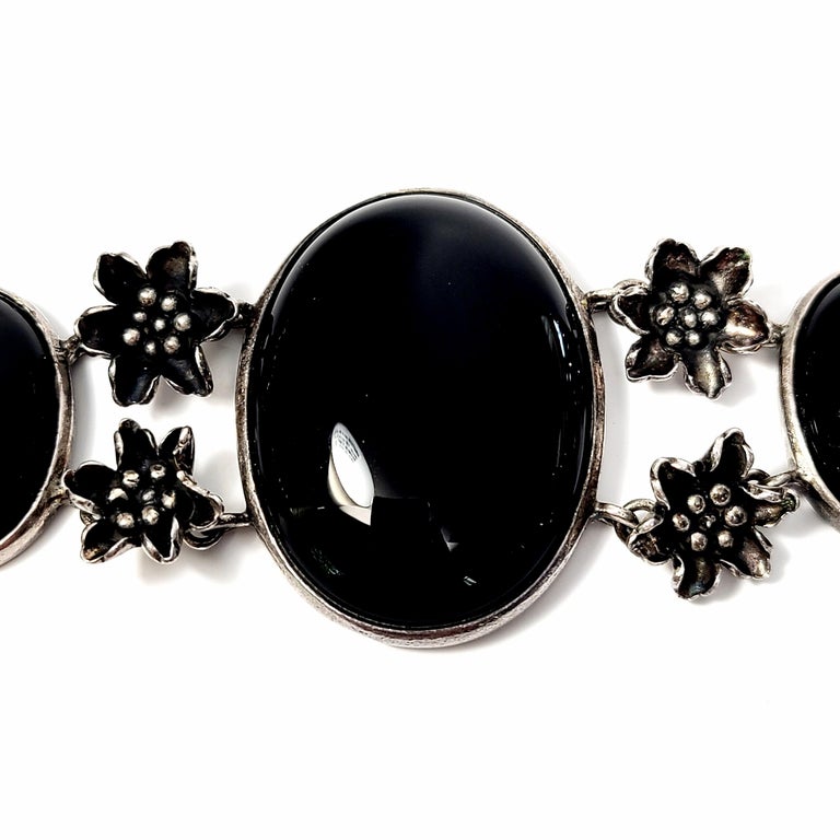 Women's Sterling Silver Black and Onyx Flower Link Toggle Bracelet For Sale