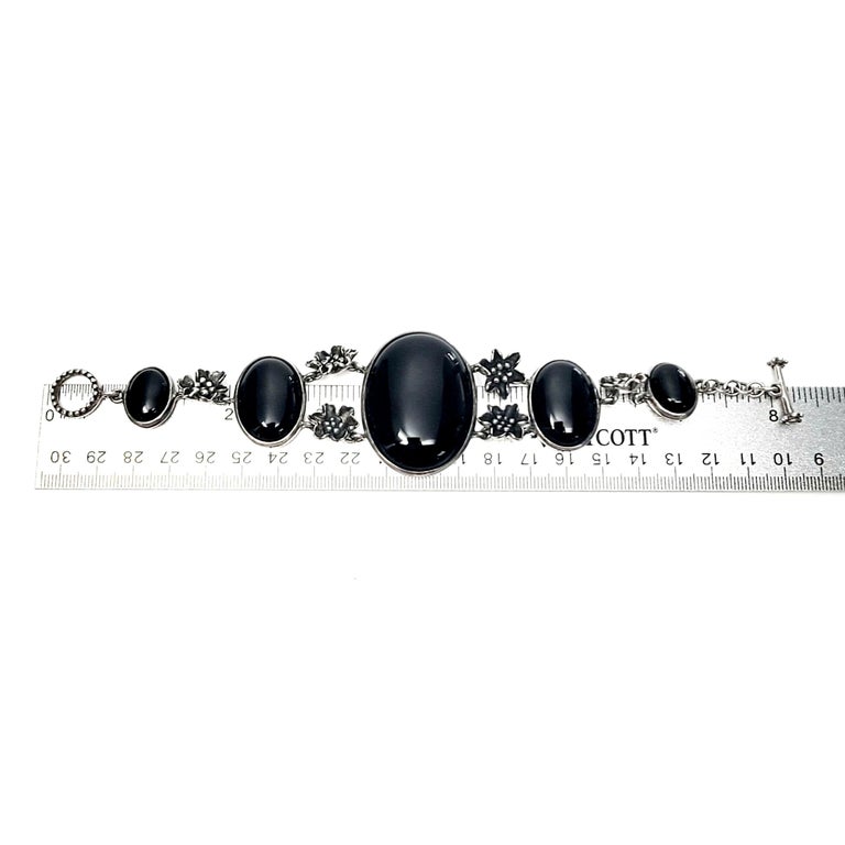Sterling Silver Black and Onyx Flower Link Toggle Bracelet For Sale 4