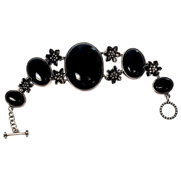 Sterling Silver Black and Onyx Flower Link Toggle Bracelet For Sale