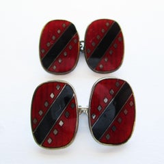 Gemelos de barra giratoria de plata de ley con esmalte negro y rojo