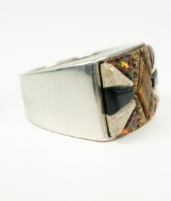 Anello con occhio di tigre in argento nero, onice di fuoco e opale di C. Begay