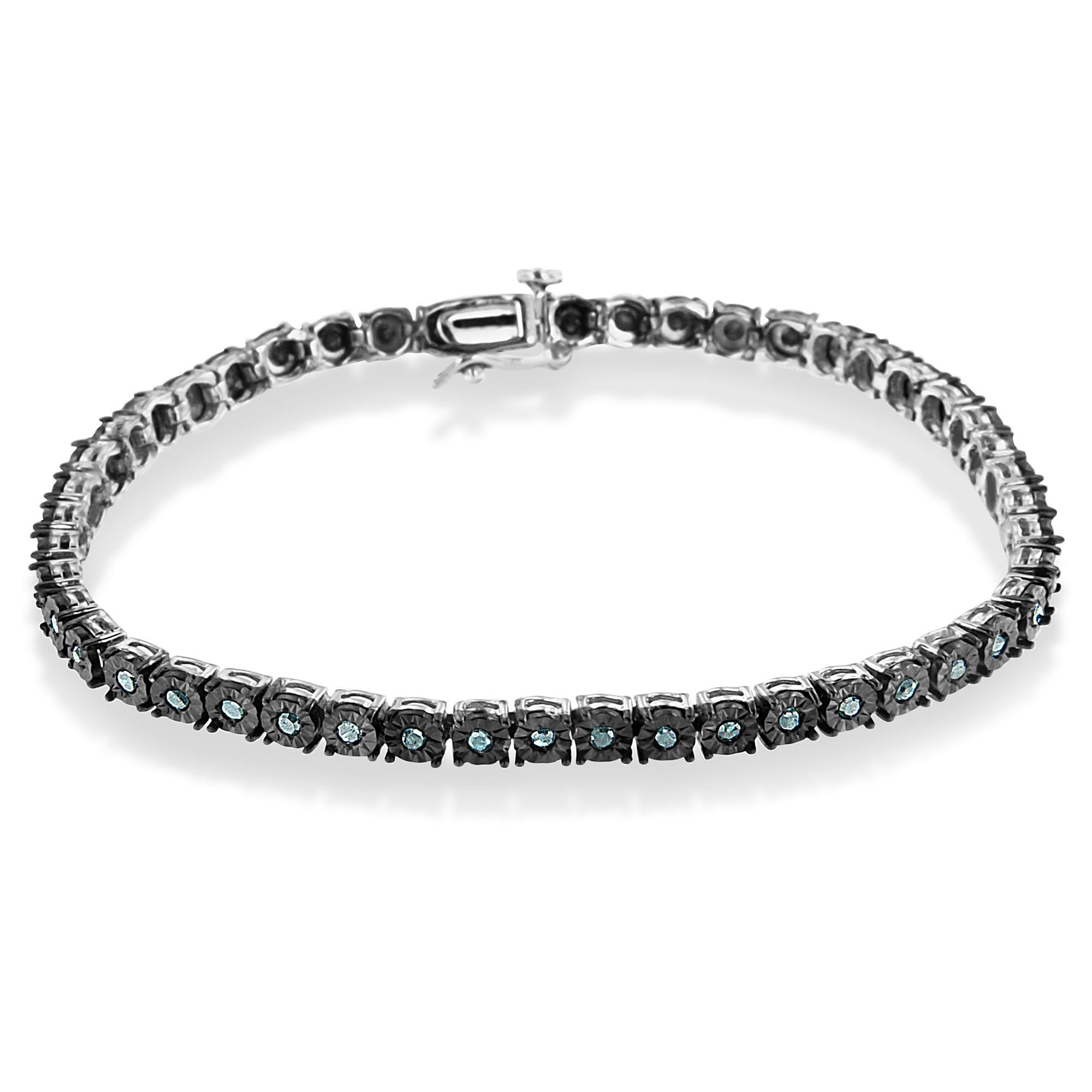 This feminine tennis bracelet is made up of the most lovely, multifaceted blue colored rose cut diamonds, which give off a wonderful sparkle. This bracelet has 48, treated blue rose-cut, promo quality diamonds, which are on the lowest on the diamond