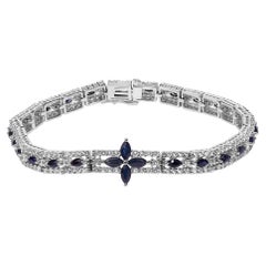 Armband aus Sterlingsilber mit blauen Saphiren und Topasen in Marquise-Schliff, mit Blumenmotiv im Art-Déco-Stil
