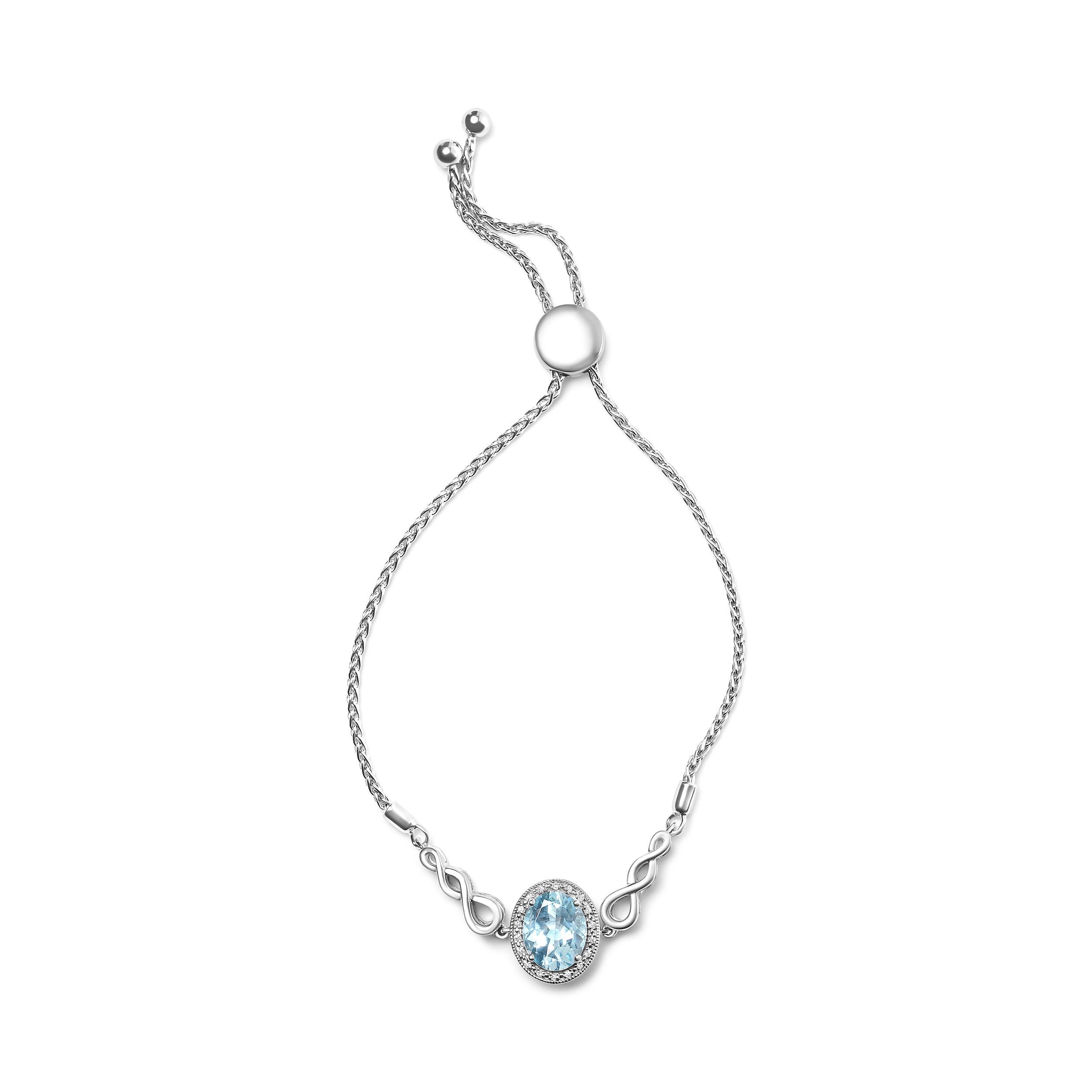 Behold the captivating beauty of this sterling silver lariat bolo bracelet, featuring a stunning 10x8mm oval blue topaz as the centerpiece. The adjustable bolo design, ranging from 4”-10”, ensures a perfect fit on any wrist size. Natural,