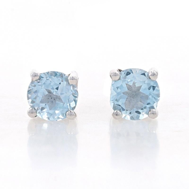 Metal Content: Sterling Silver

Stone Information

Natural Blue Topaz
Treatment: Routinely Enhanced
Carat(s): 2.00ctw
Cut: Round
Diameter: 6mm

Total Carats: 2.00ctw

Style: Stud
Fastening Type: Butterfly Closures

Measurements

Diameter: 1/4