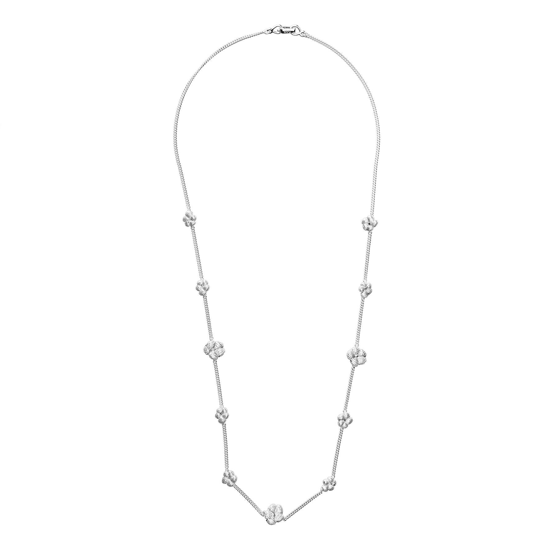 The Bordados Flowers Necklace from the Bordados Collection by TANE is handmade in sterling silver by TANE's expert artisans in Mexico. With a total length of 23.6