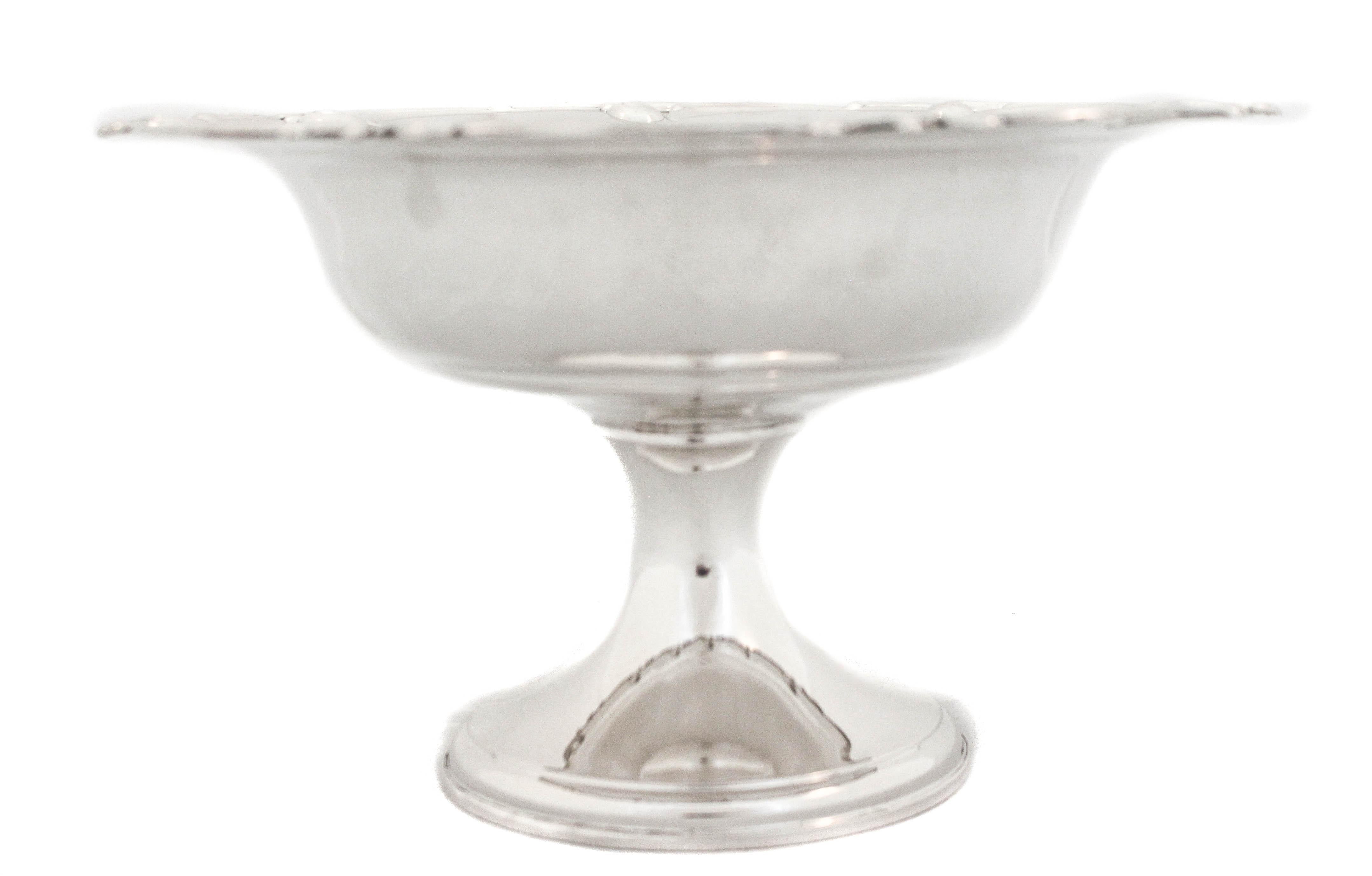 Being offered is a sterling silver bowl on a pedestal. Manufactured by the International Silver Company in the 1930’s, it has a scalloped edge with a swirl pattern. The bowl is deep and can hold a substantial amount. Would look beautiful on a