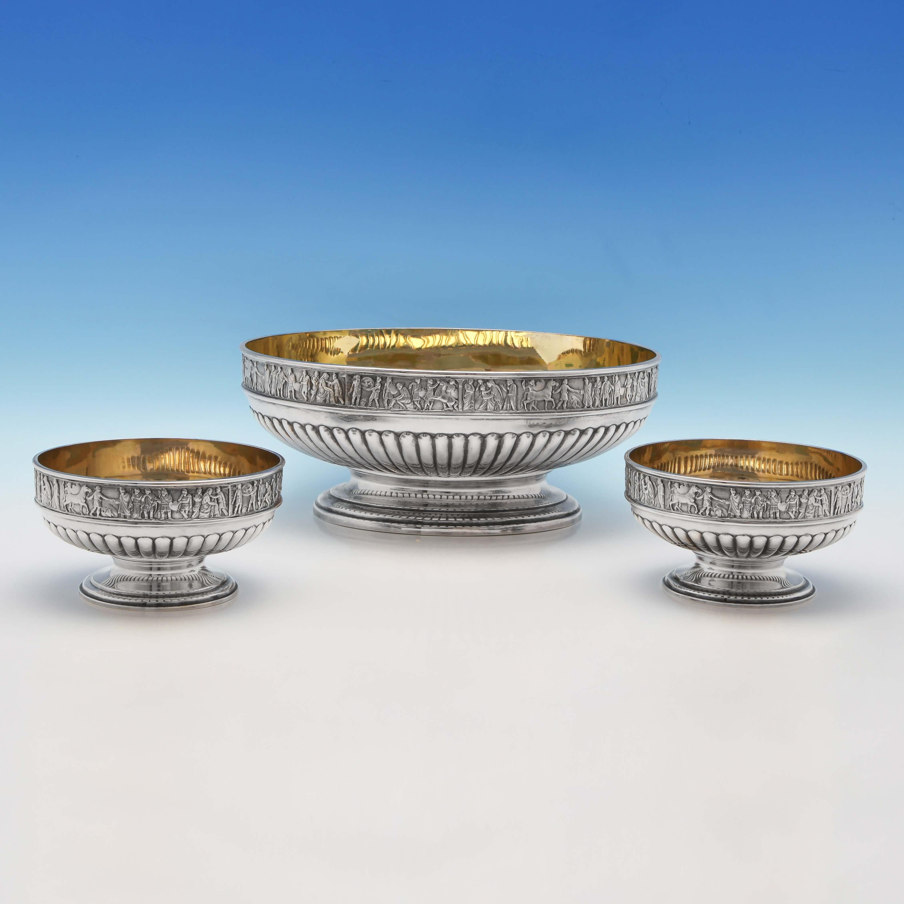 Hallmarked in London in 1892 by Elkington & Co. This heavy and impressive Antique, Victorian, Sterling Silver Set of Three Bowls sits on its original Mirror Plateau base. The bowls and plateau feature borders modelled as a classical Roman frieze.