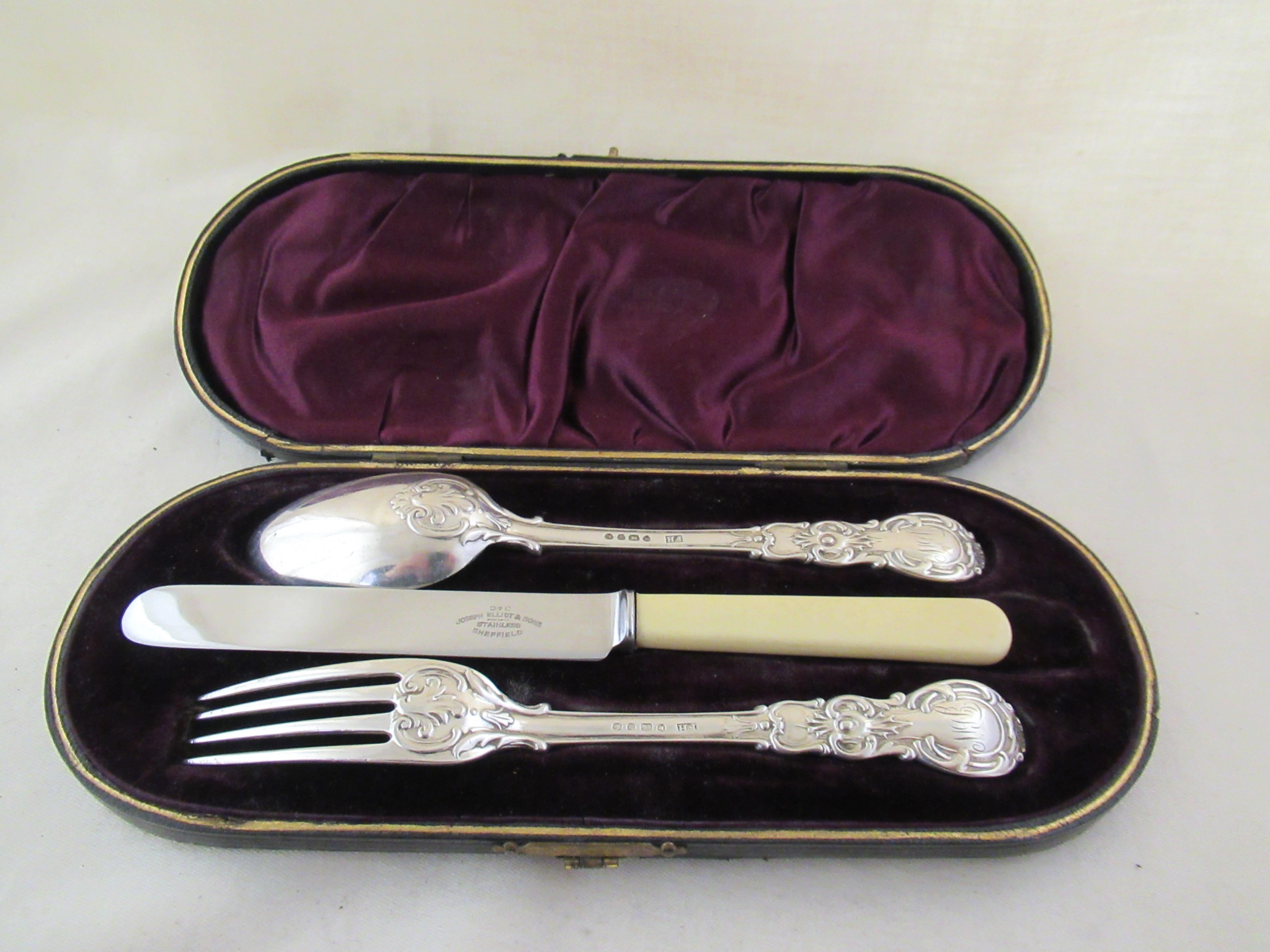 Sterling silver knife, fork & spoon christening set.
The silver fork and spoon are stamped with a full English hallmark,
 applied by the London Assay Office:-
 Queen Victoria`s Head - Duty mark (duty has been paid to the Crown).
 Upper case K -