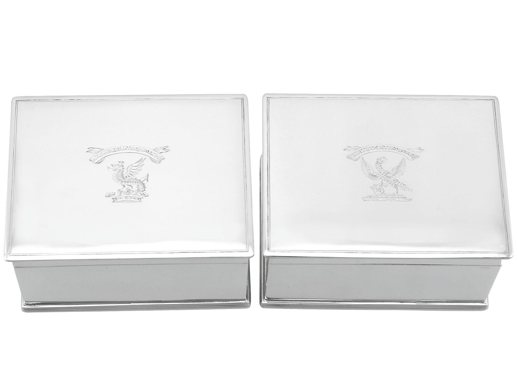 An exceptional, fine and impressive, rare pair of antique George IV English sterling silver boxes; an addition to our 19th century silverware collection.

These exceptional and rare antique George IV sterling silver boxes have a plain rectangular